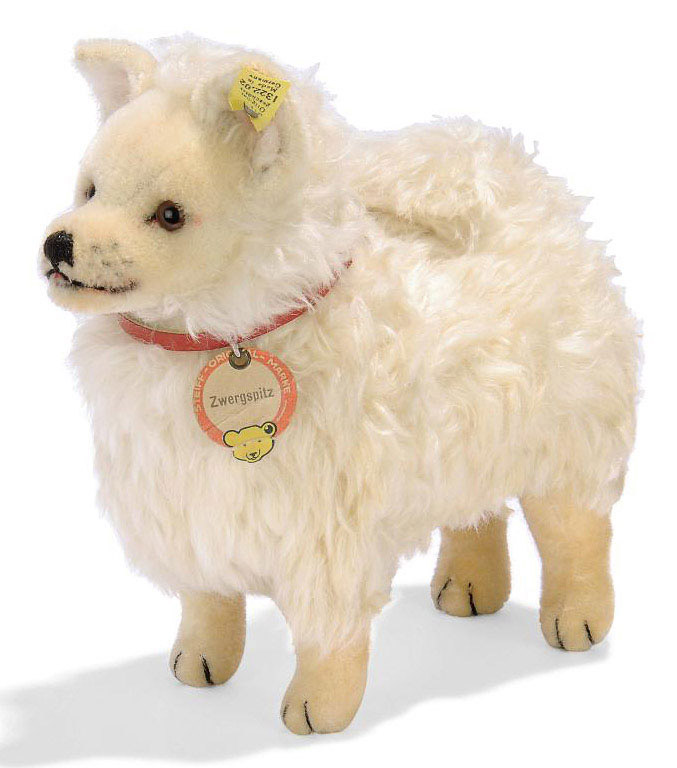 TWO STEIFF SMALL HEAD TURNING DOGS a seated Rattler 3308 H