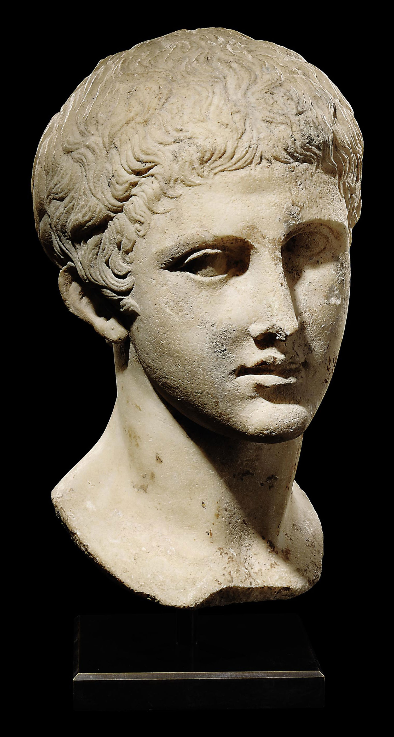A ROMAN MARBLE BUST OF AN ATHLETE , CIRCA EARLY 1ST CENTURY A.D