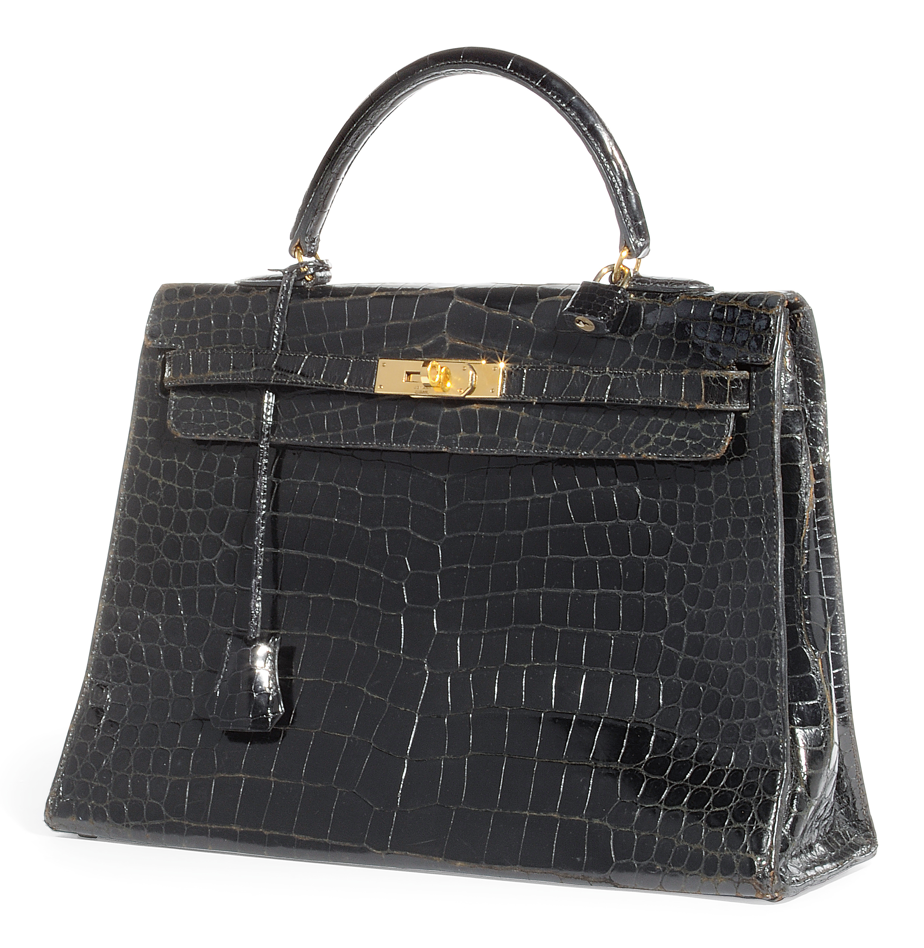 A NOIR CROCODILE 'KELLY' BAG , HERMÈS, 1960S | Christie's