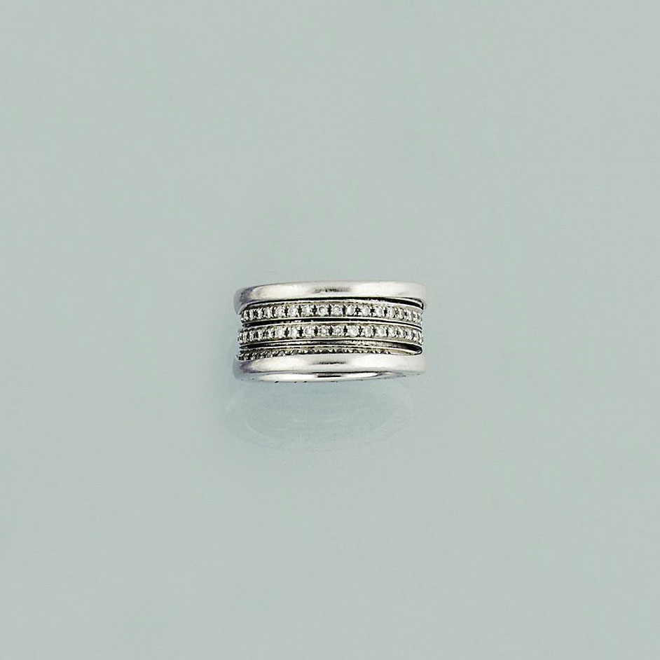 A Diamond Eternity Ring By Bulgari Eternity band in thin size in 18 kt rose gold with demi tour round brilliant cut diamonds. christie s