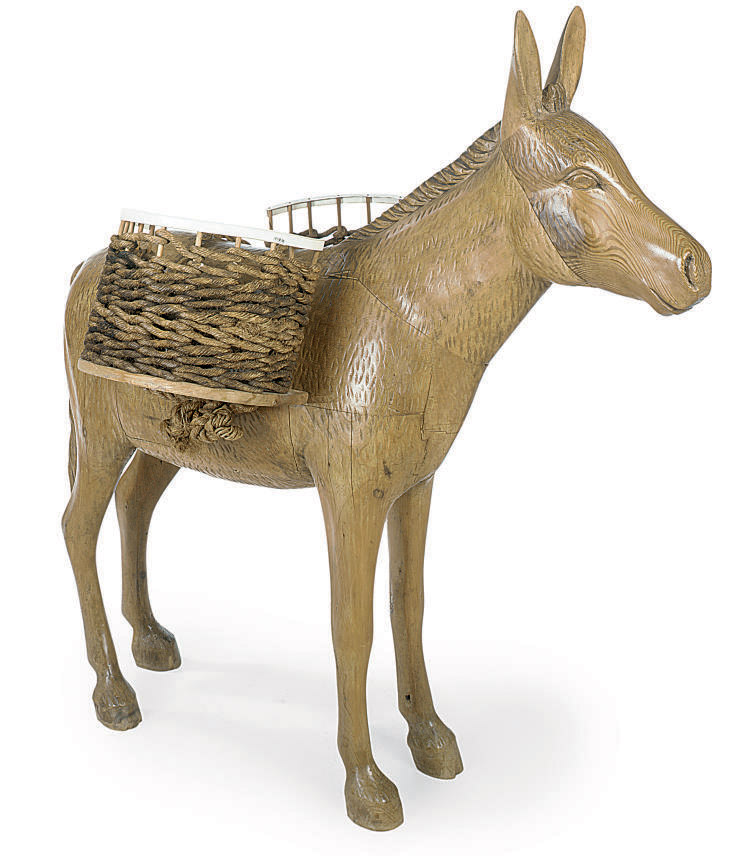 A LARGE NOVELTY PINE CARVING OF A DONKEY , 20TH CENTURY | Christie’s