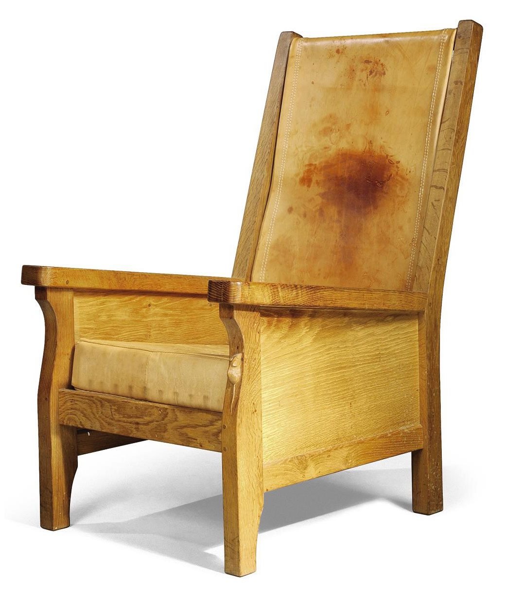 A ROBERT THOMPSON 'MOUSEMAN' OAK AND LEATHER 'SMOKER'S' CHAIR , LATE
