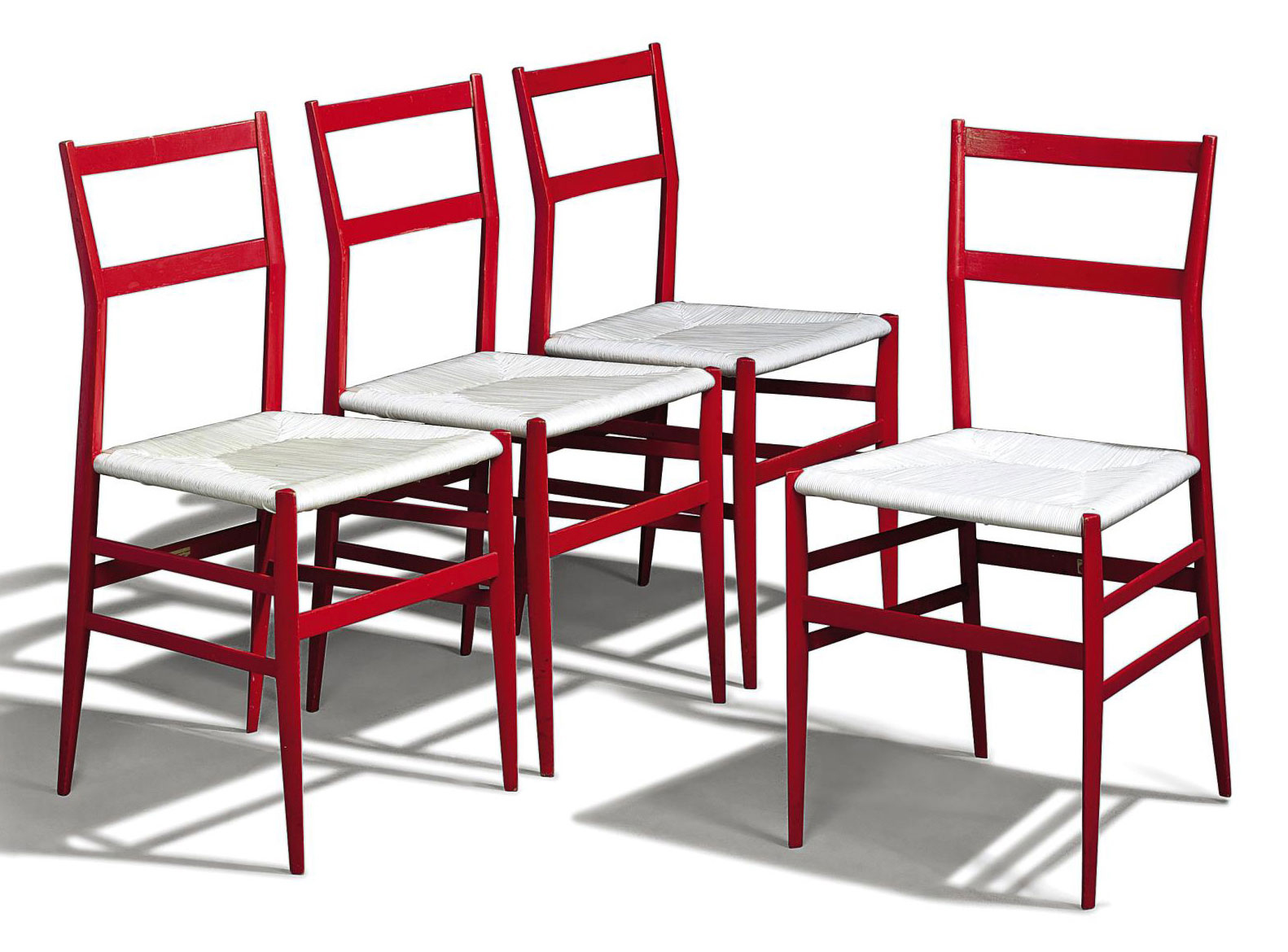 A Set Of Four Gio Ponti Superleggera Chairs