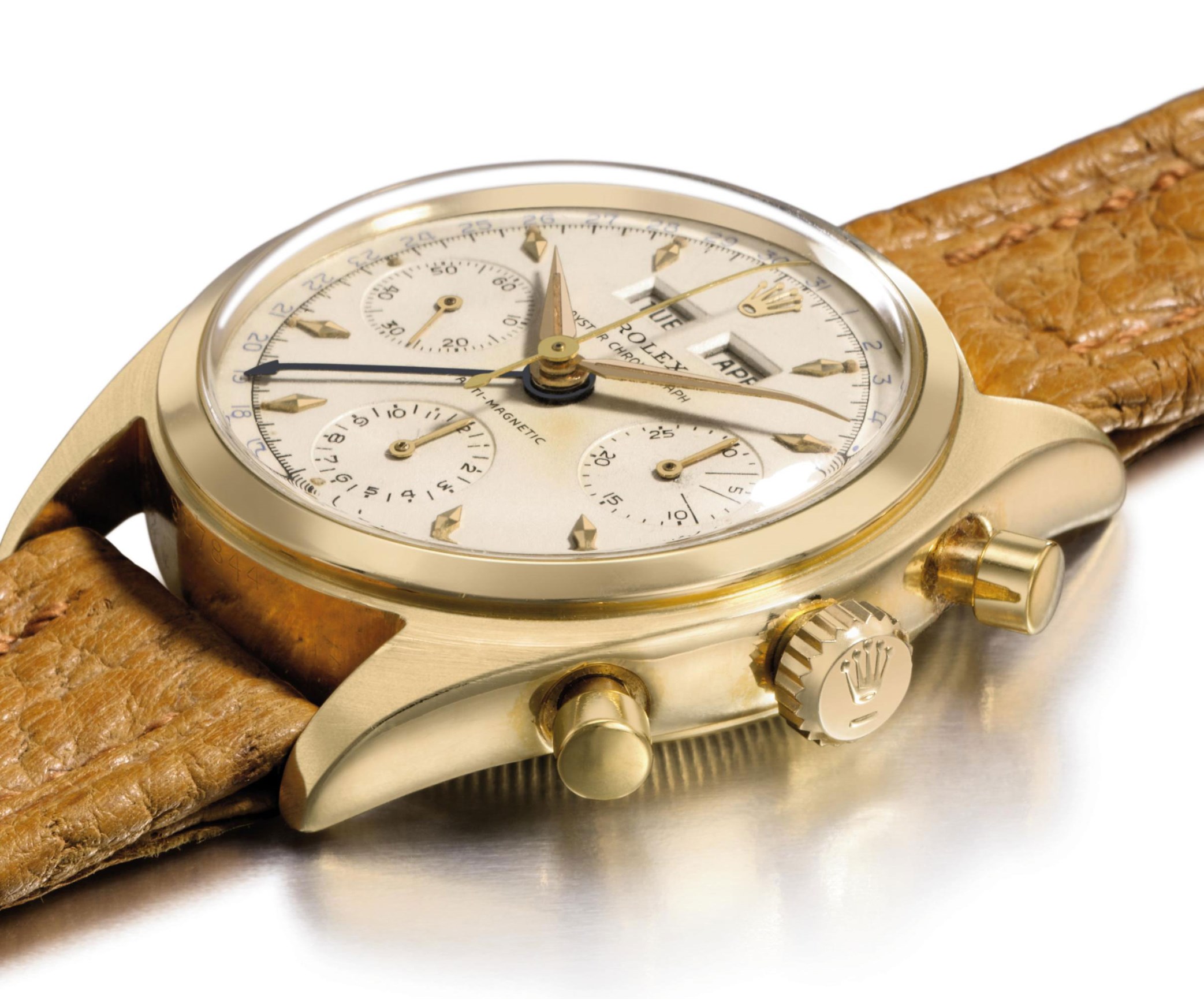 Rolex. A very fine and extremely rare 18K gold triple calendar