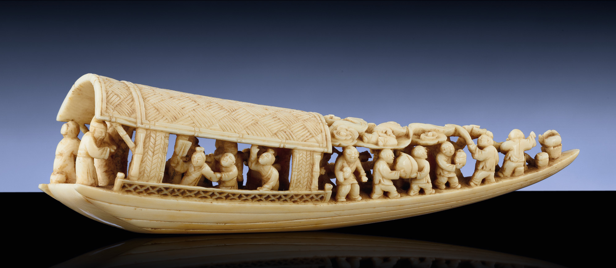 AN IVORY CARVING OF A SAMPAN Christie's