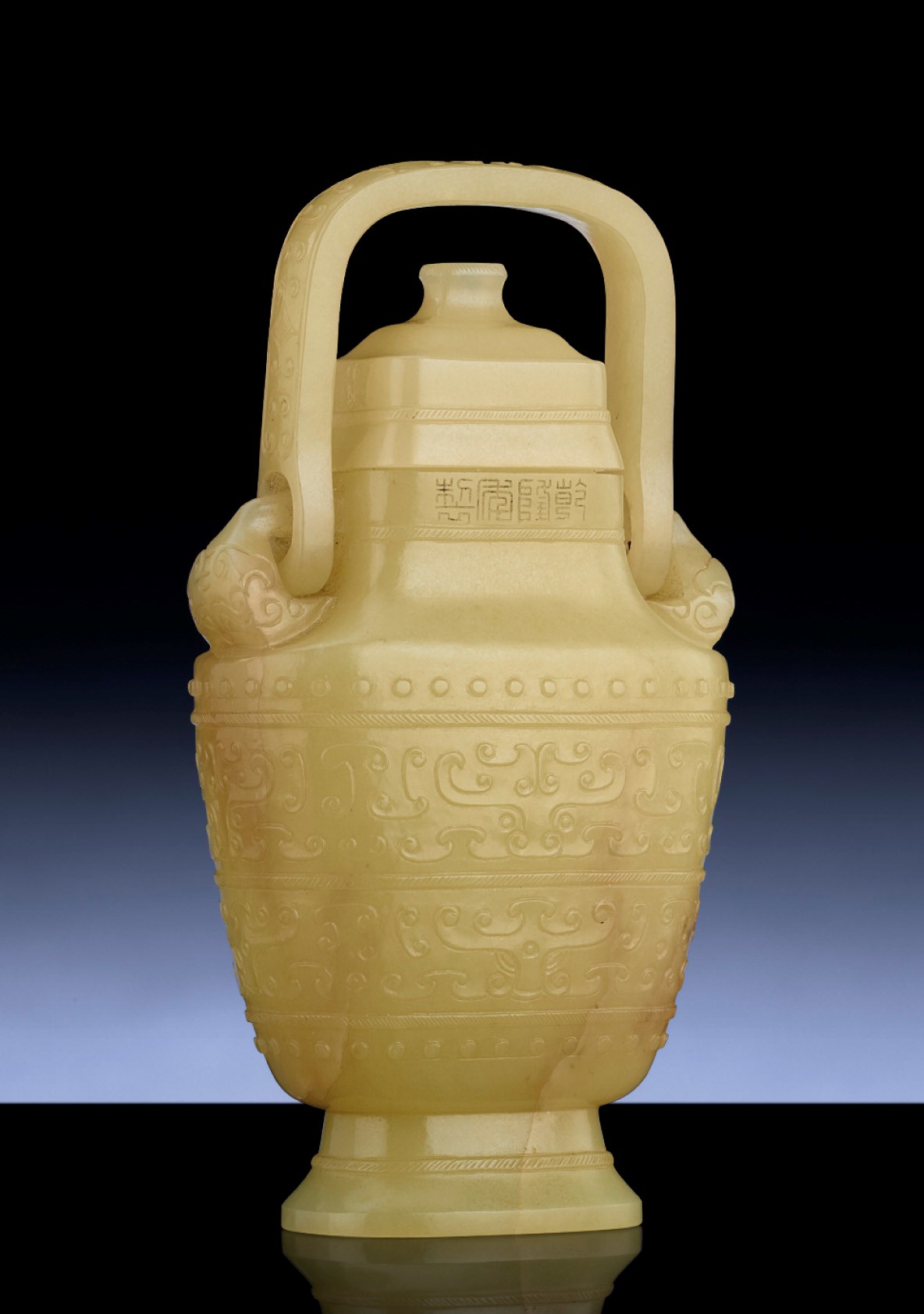 A YELLOW JADE VASE AND COVER Christie's
