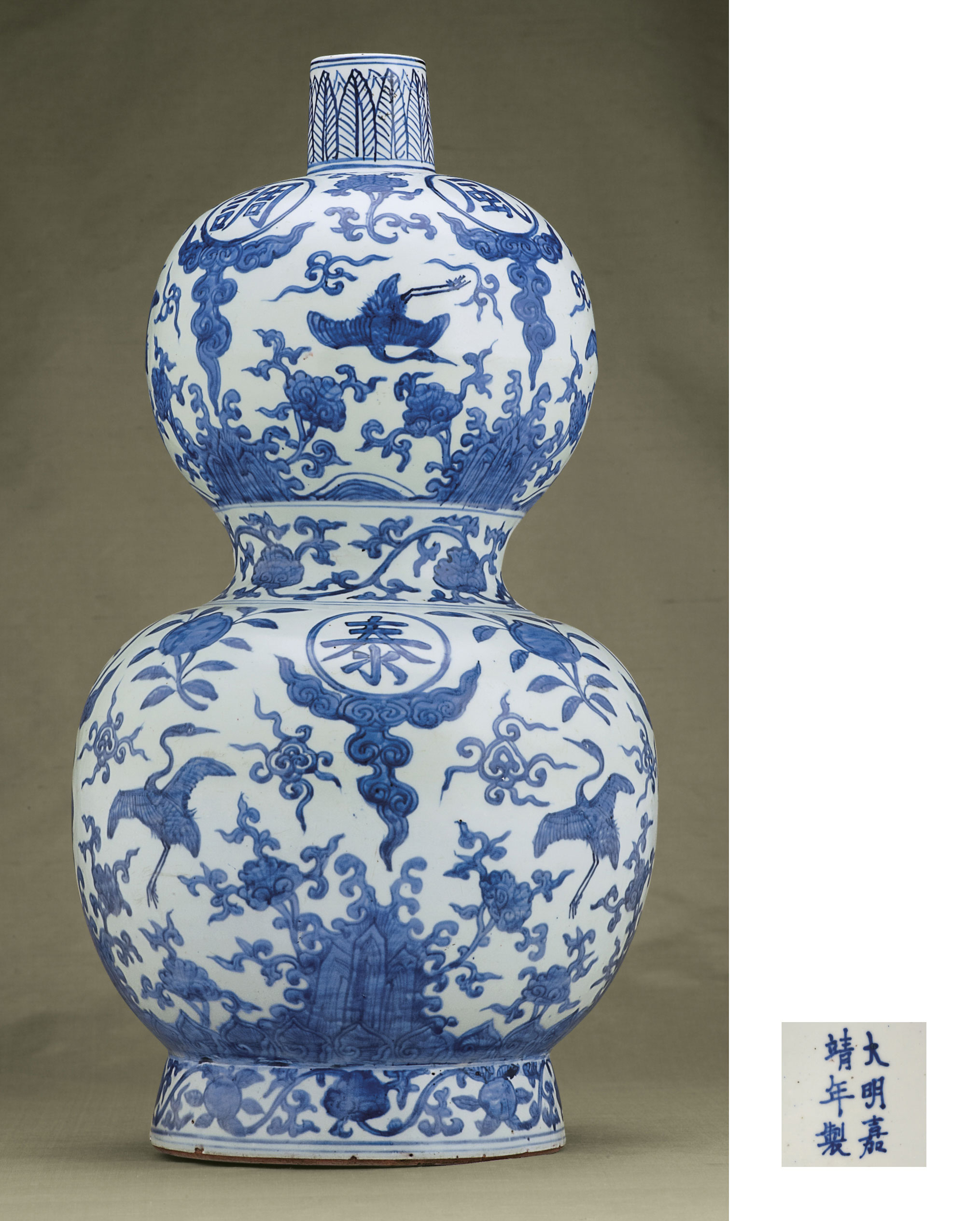 A LARGE BLUE AND WHITE DOUBLEGOURD VASE , JIAJING SIXCHARACTER MARK