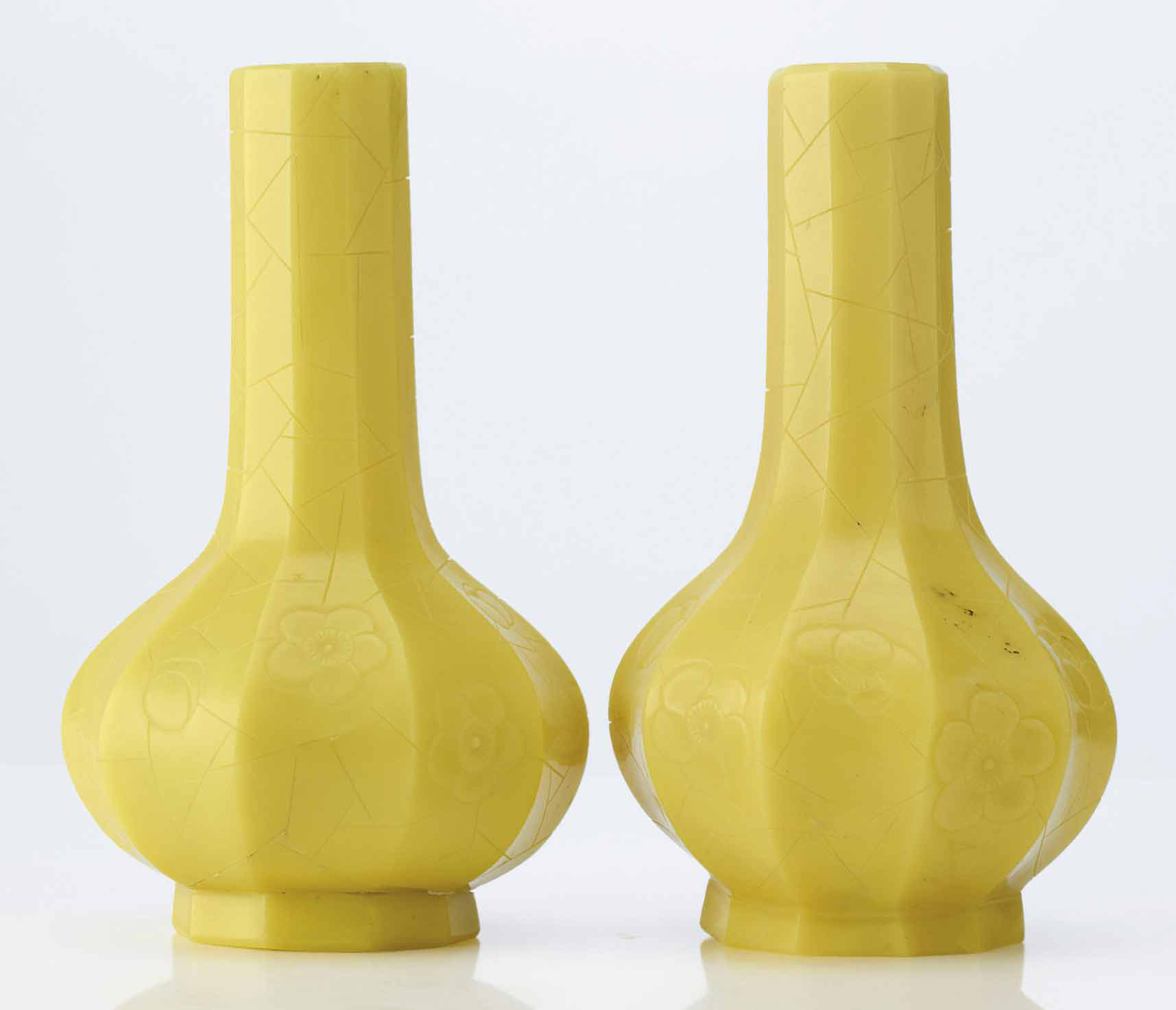 TWO SMALL CARVED OPAQUE LEMONYELLOW GLASS FACETTED BOTTLE VASES , QING