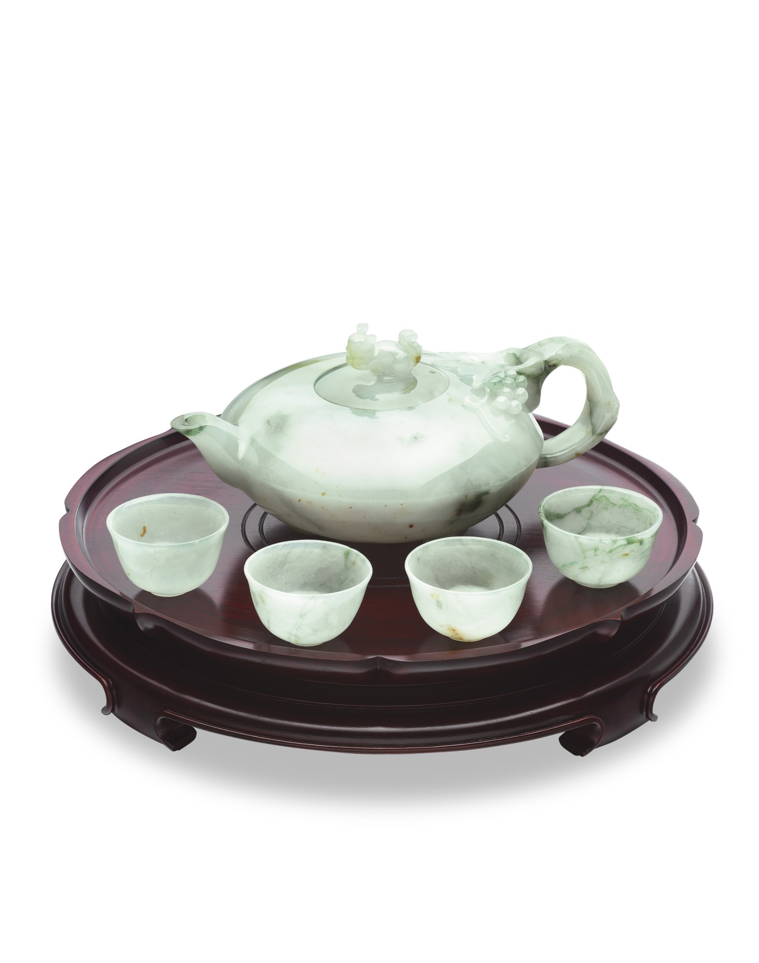 A SET OF JADEITE TEAPOT AND TEACUPS