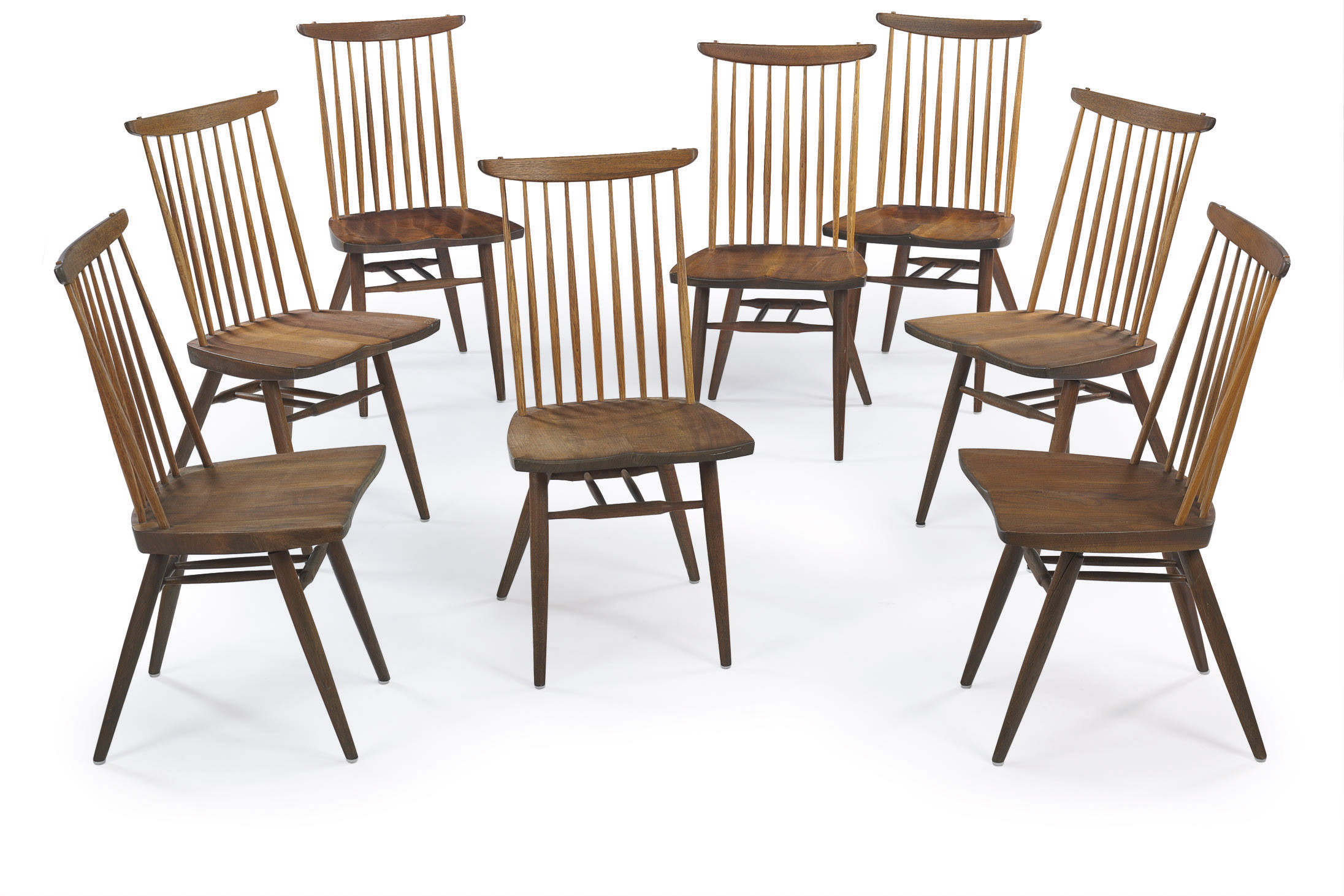 NAKASHIMA (19051990) , A SET OF EIGHT NEW WALNUT DINING CHAIRS, CIRCA 1965 AND 1980