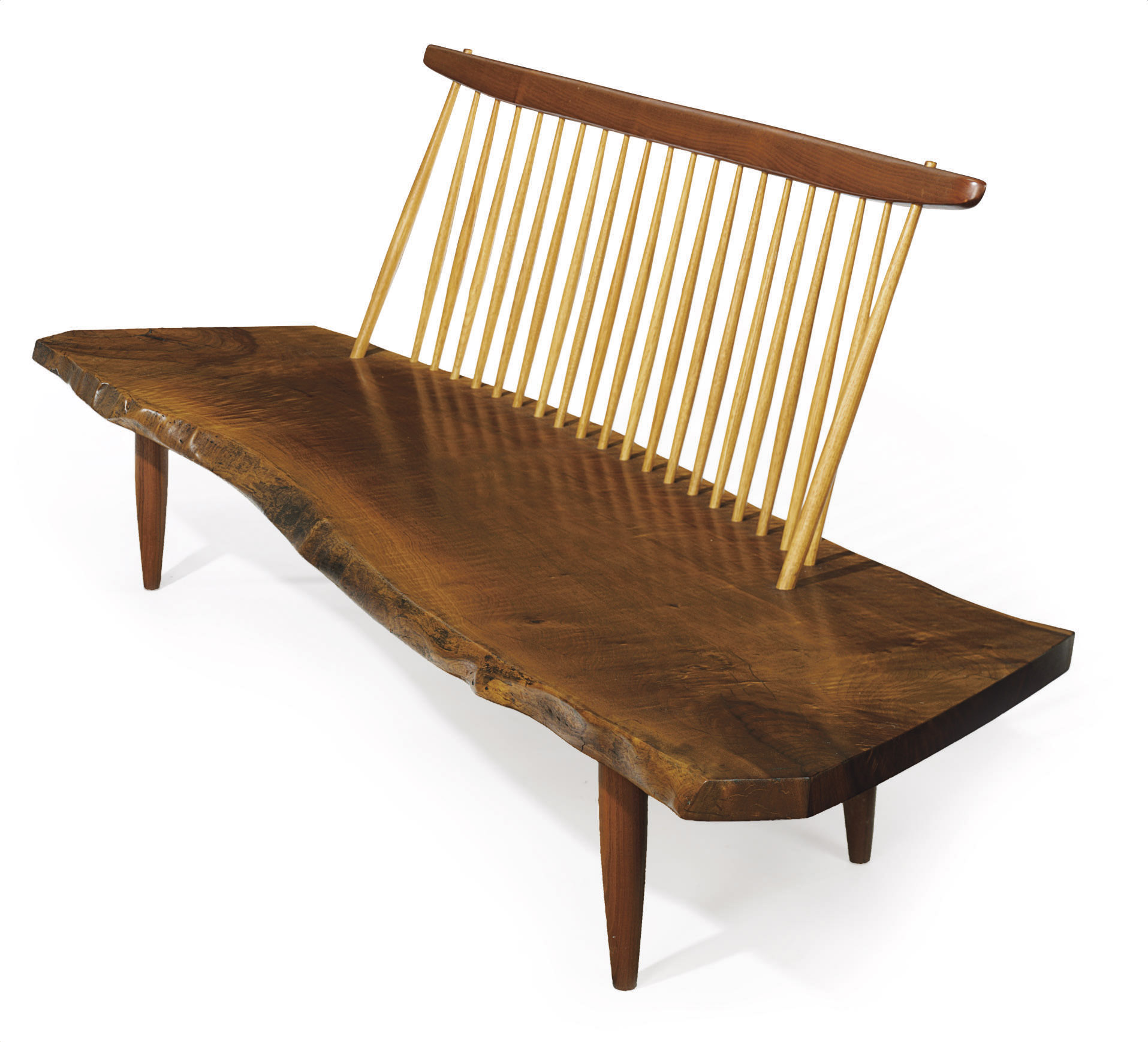NAKASHIMA (19051990) , A WALNUT AND HICKORY CONOID BENCH, 1972 Christie's