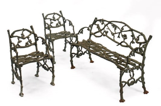A SUITE OF CAST-IRON GARDEN FURNITURE,