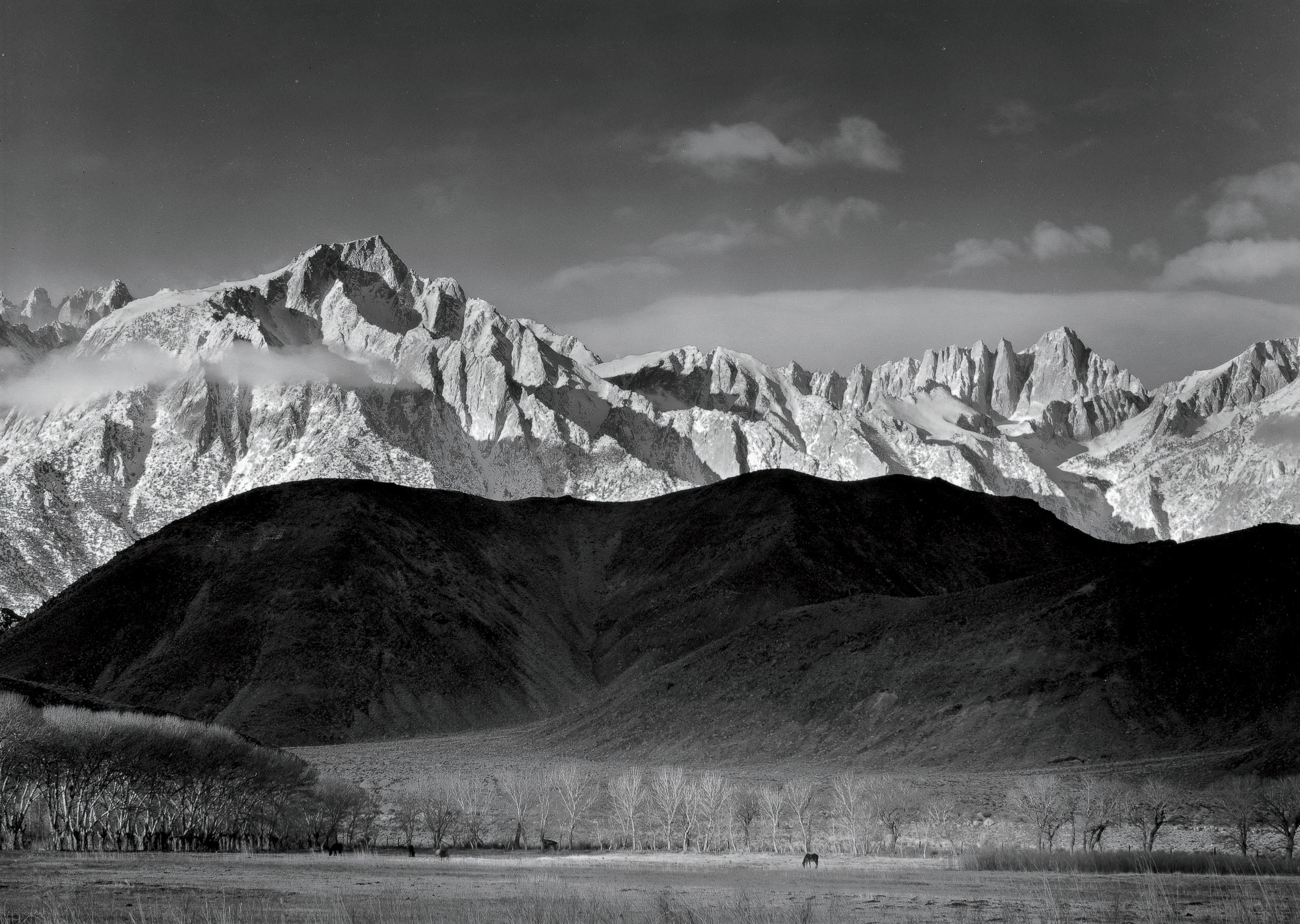 ANSEL ADAMS (1902-1984) , Winter Sunrise, Sierra Nevada, from Lone Pine