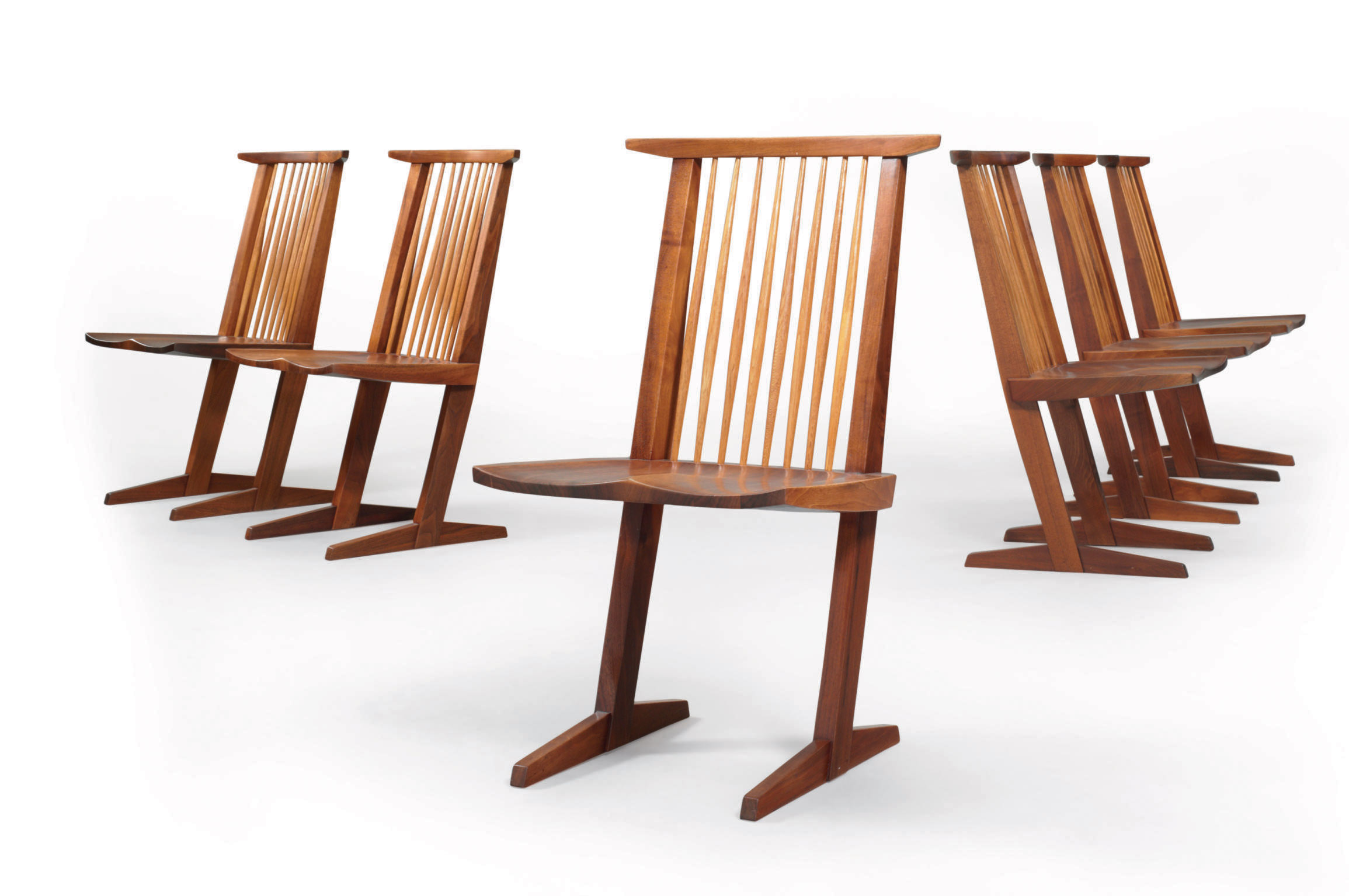 NAKASHIMA (19051990) , A SET OF SIX WALNUT CONOID CHAIRS, 1970