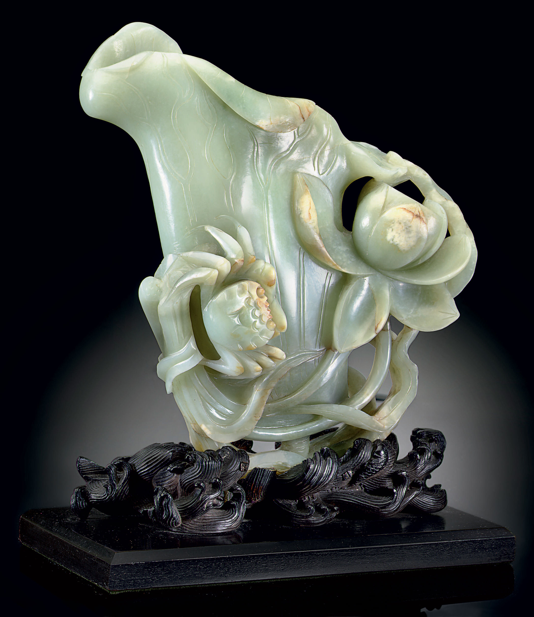 A LARGE PALE CELADONGREEN JADE LOTUS LEAFFORM VASE , 18TH CENTURY