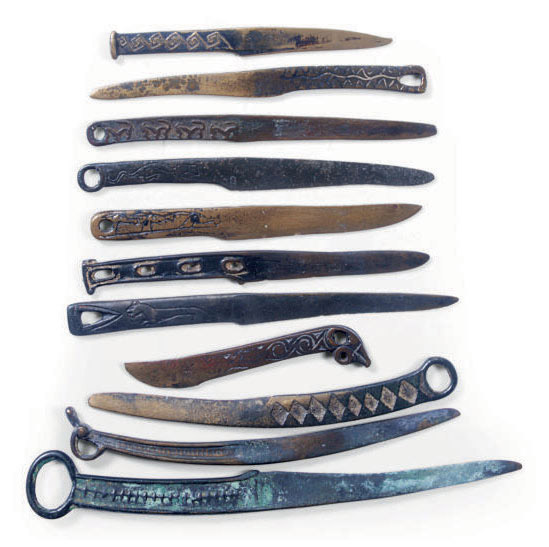 ELEVEN CHINESE BRONZE KNIFE COINS, , EASTERN HAN DYNASTY (AD 25220) OR