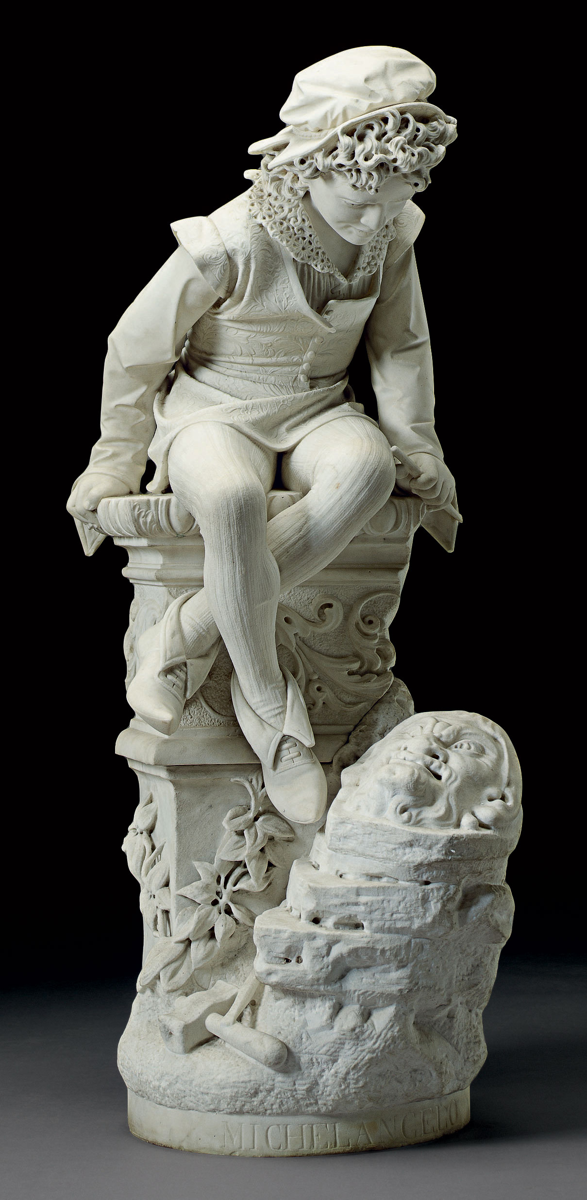 AN ITALIAN MARBLE FIGURE OF YOUNG MICHELANGELO