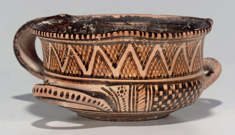 A Greek Pottery Trefoil Lipped Cup Geometric Period Circa 750