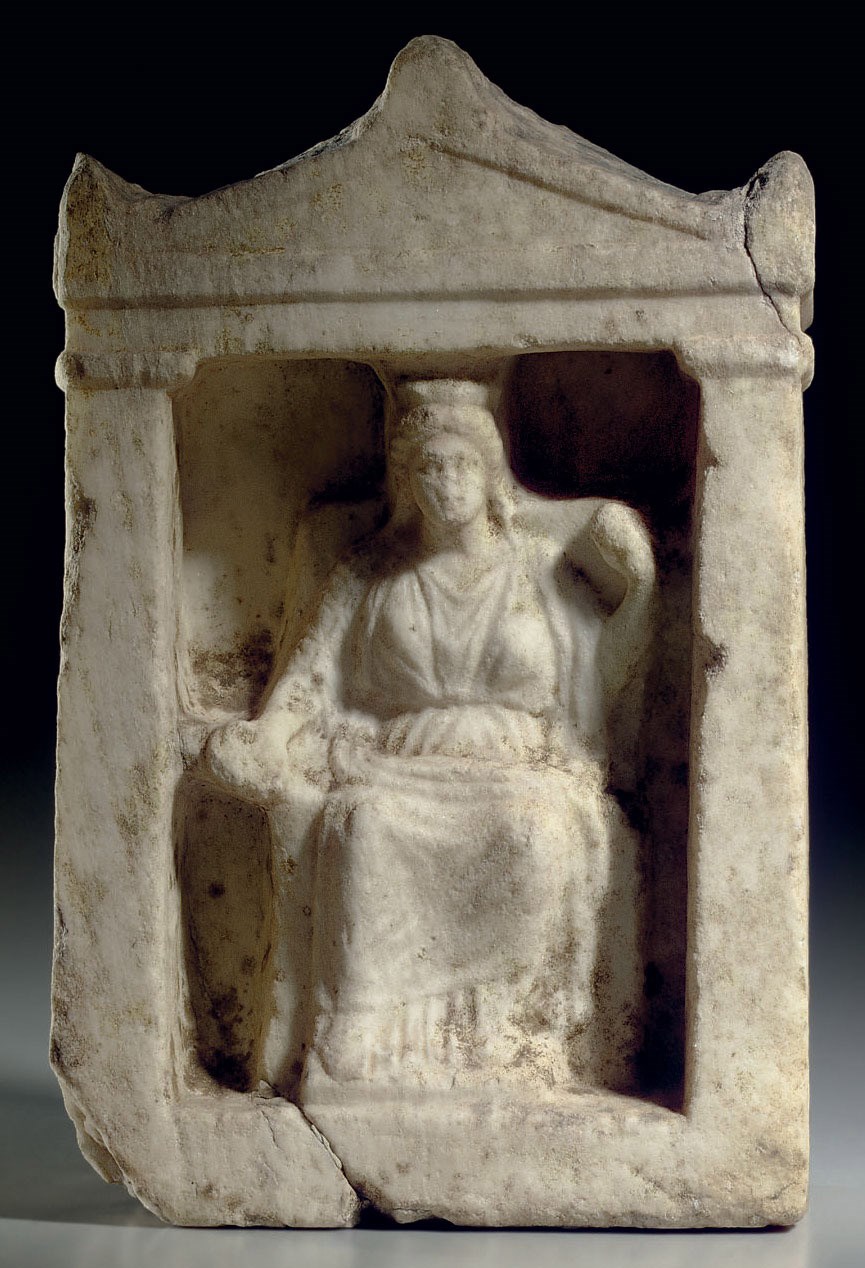 A GREEK MARBLE VOTIVE STELE , CLASSICAL PERIOD, CIRCA 4TH CENTURY B.C