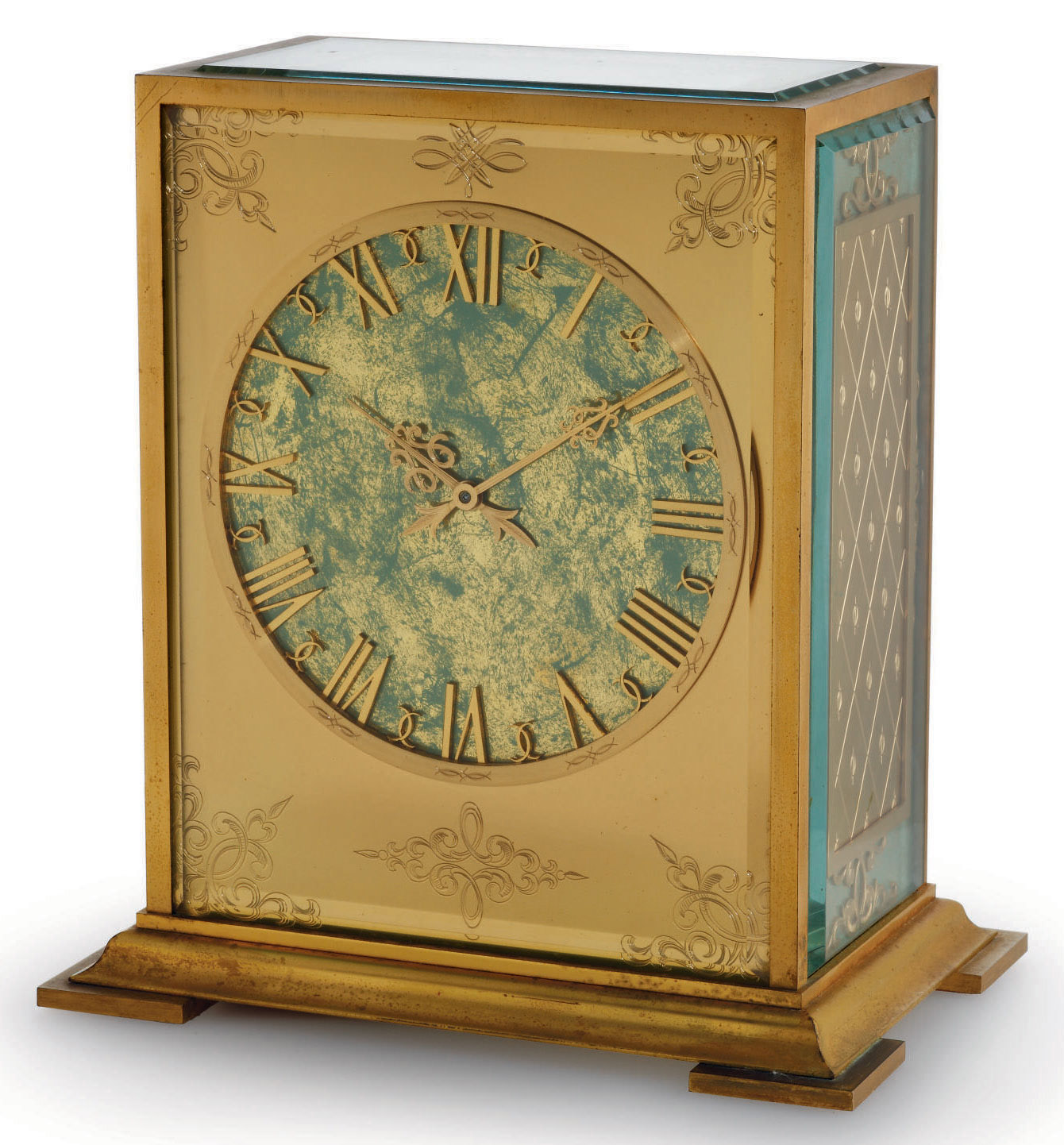 PATEK PHILIPPE. A FINE GILT BRASS SOLARPOWERED DESK CLOCK