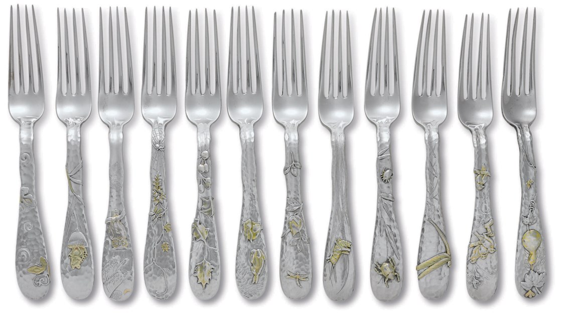 A SET OF TWELVE AMERICAN PARCELGILT SILVER DINNER FORKS