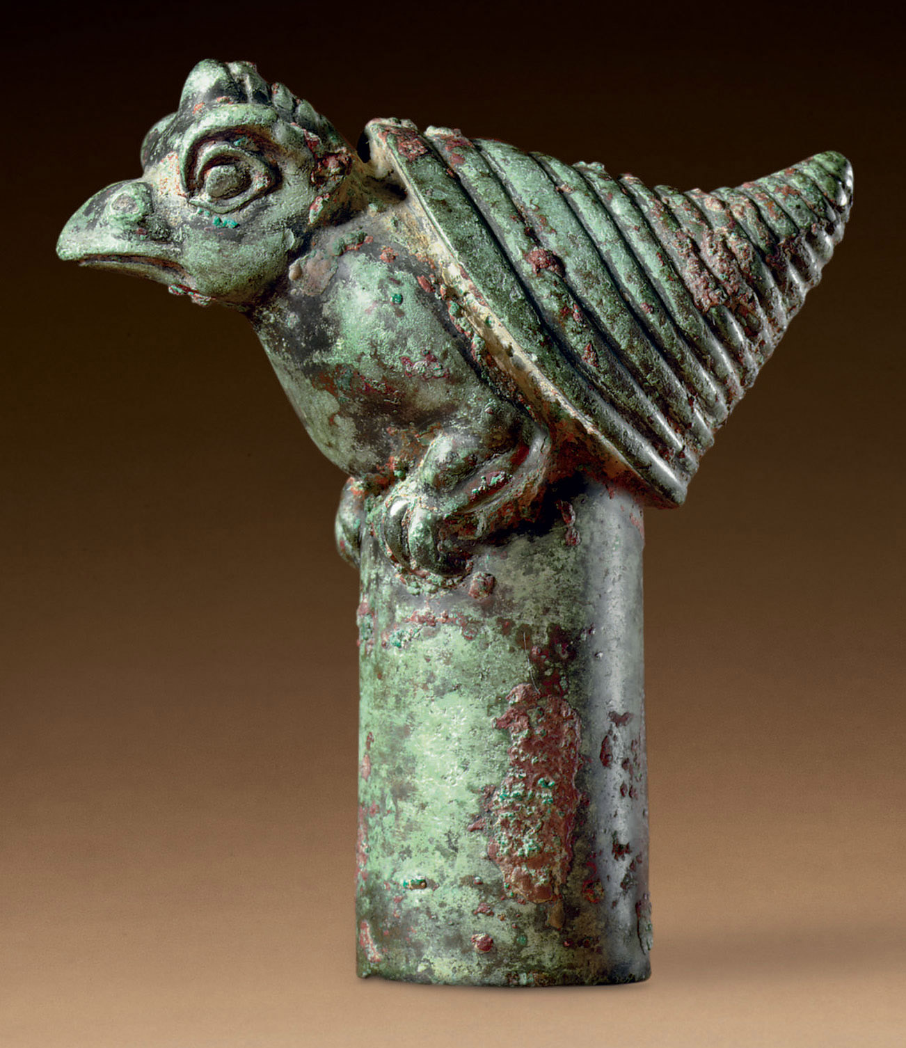 A RARE BRONZE ZOOMORPHIC FINIAL , WARRING STATES PERIOD (475221 BC