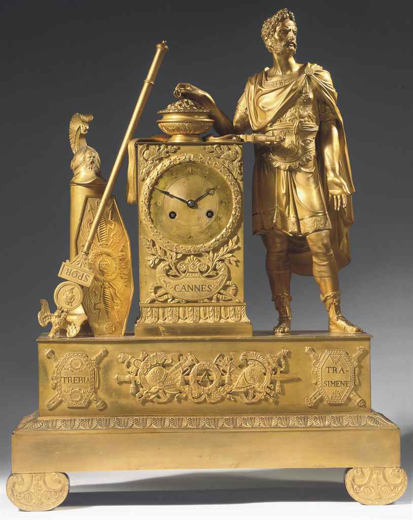 A RESTAURATION ORMOLU STRIKING MANTEL CLOCK DEPICTING THE FIGURE OF