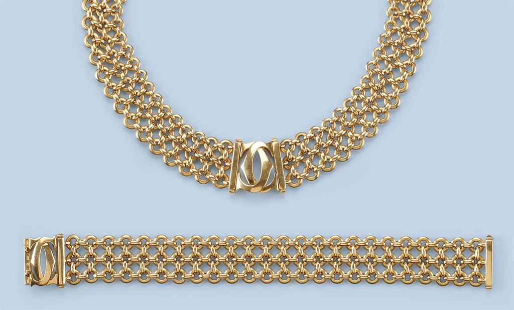 A GOLD NECKLACE AND MATCHING BRACELET, BY CARTIER