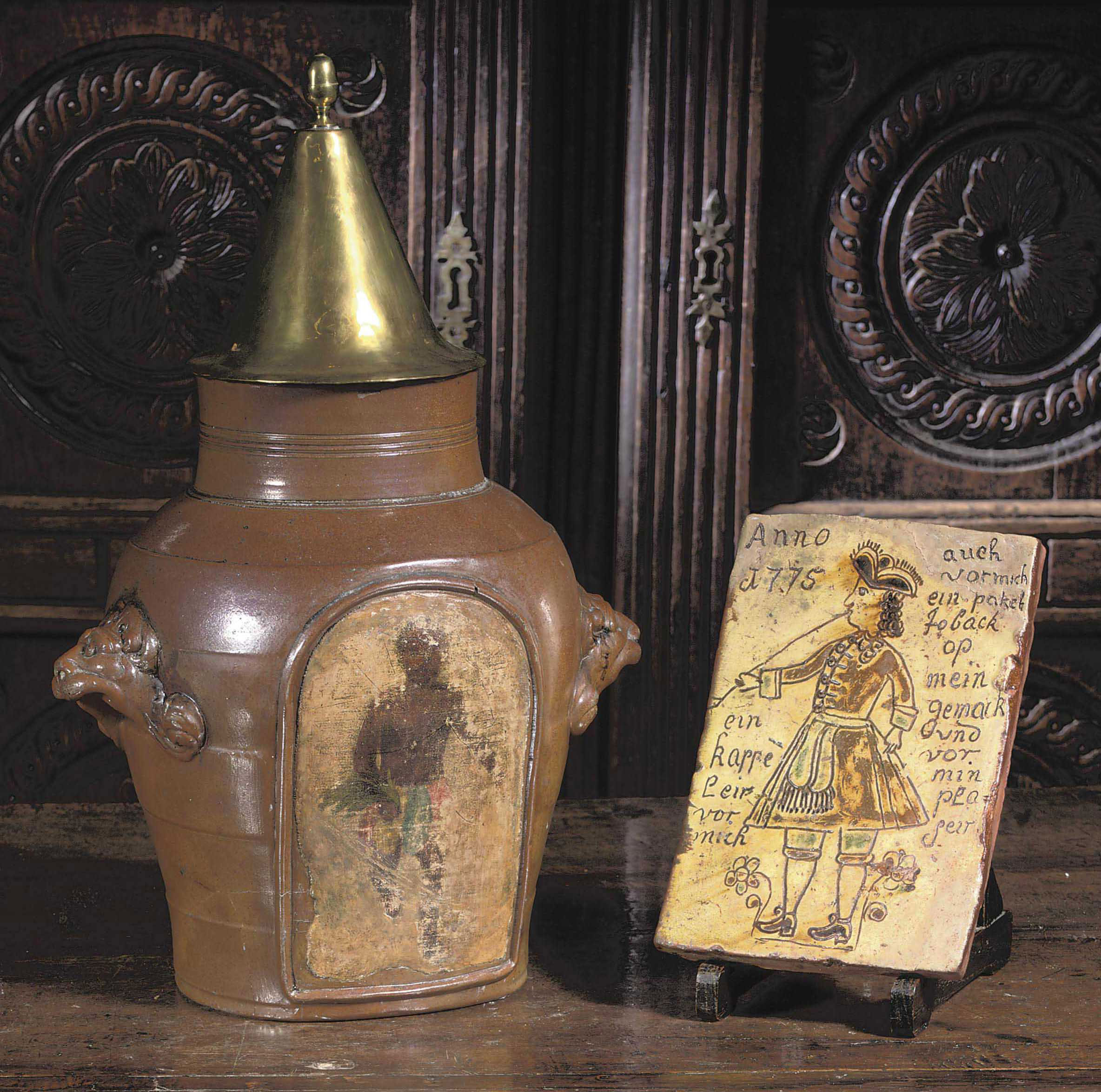 A Dutch stoneware tobacco jar and brass cover , 18TH 19TH CENTURY