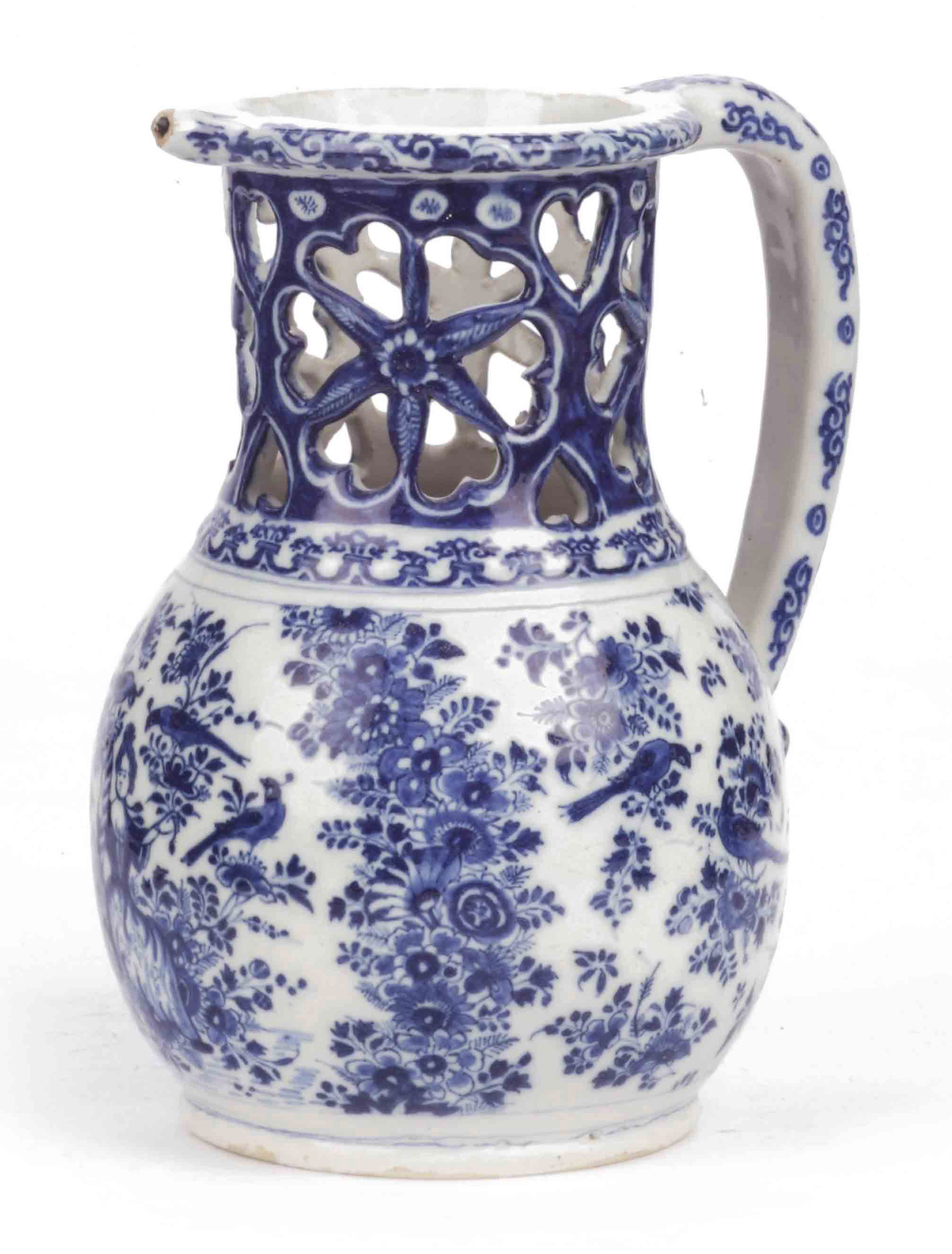 A Dutch Delft blue and white puzzlejug , 18TH CENTURY Christie's