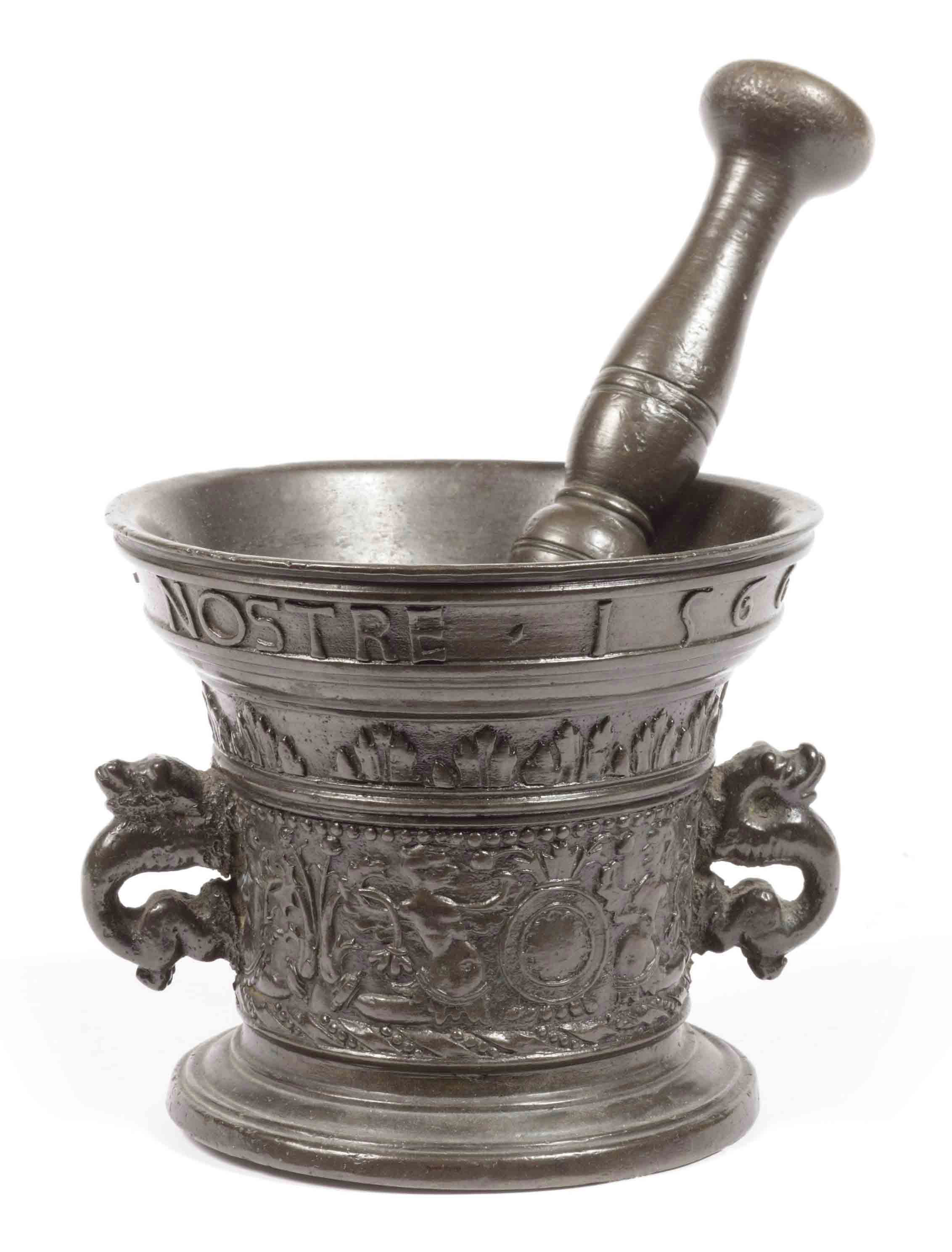 A DUTCH BRONZE MORTAR AND PESTLE , ATTRIBUTED TO WILLEM WEGEWART SR