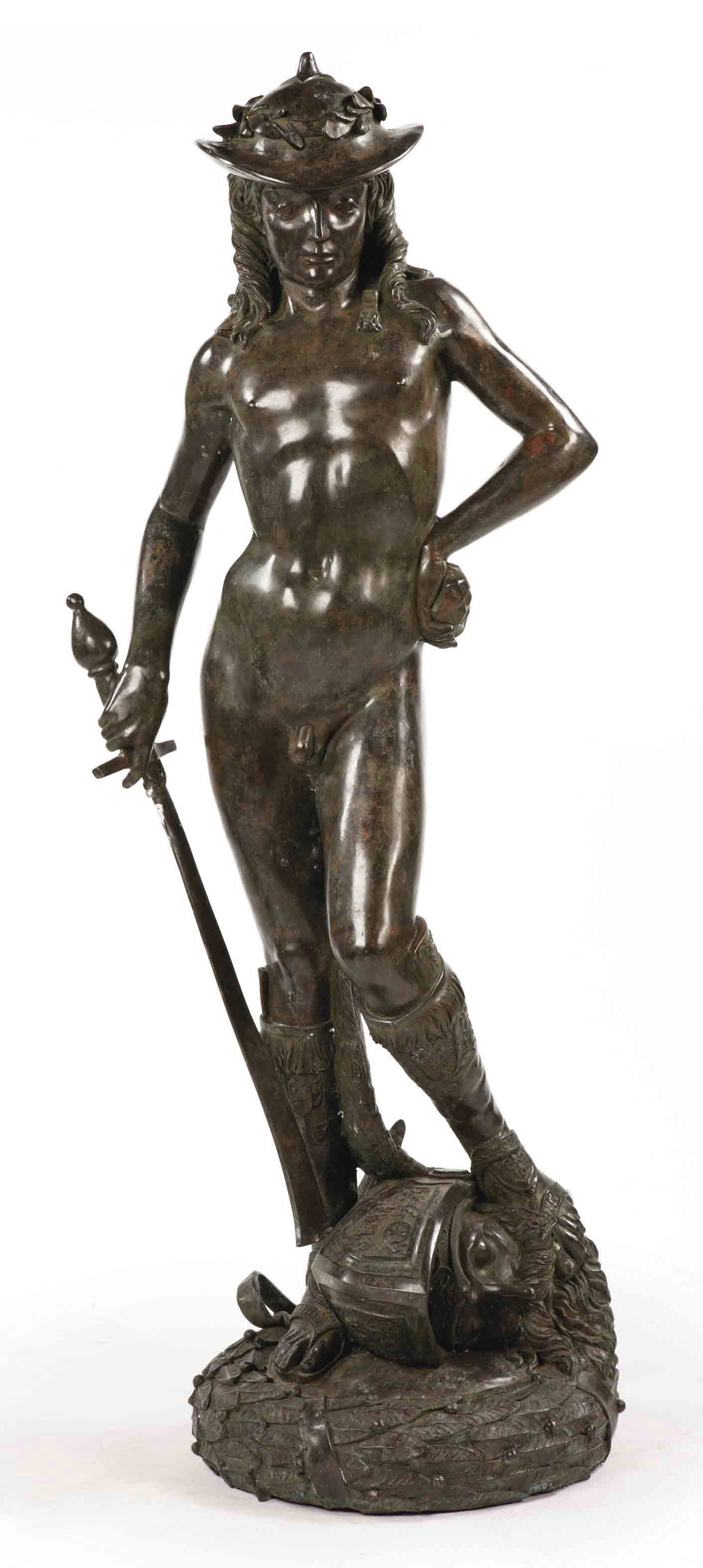A BRONZE FIGURE DEPICTING DAVID , AFTER A MODEL BY DONATELLO, 20TH