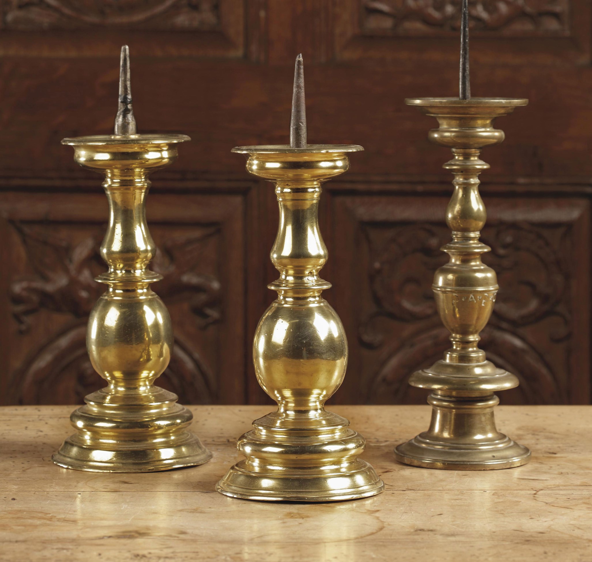 A pair of SouthGerman brass pricket candlesticks , 17TH CENTURY