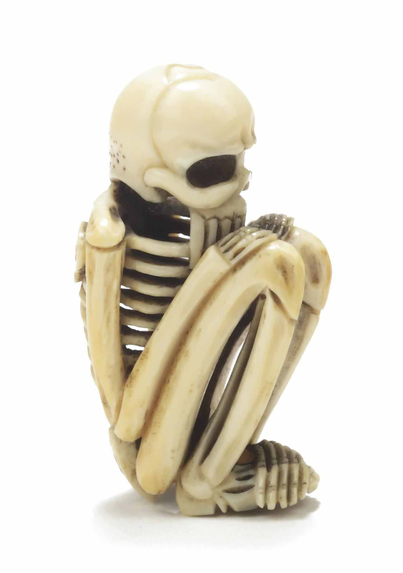 A Japanese ivory netsuke of a skeleton , EDO, 19TH CENTURY | Christie's