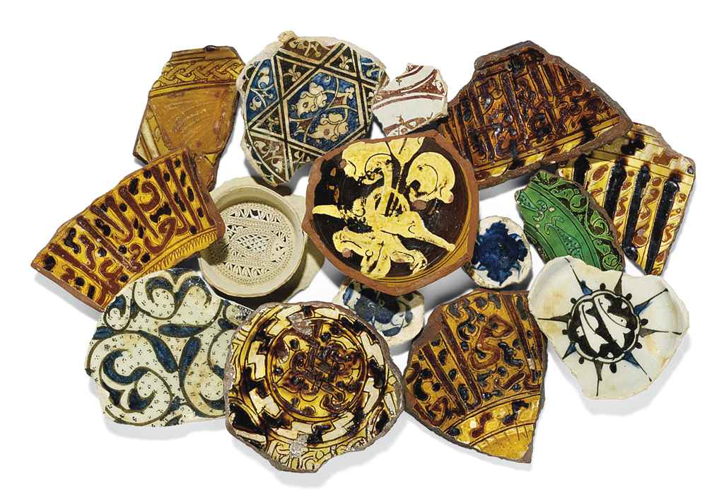 A GROUP OF "FOSTAT" POTTERY FRAGMENTS , EGYPT AND SYRIA, FATIMID AND