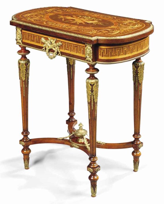 A FRENCH ORMOLU-MOUNTED MAHOGANY, AMARANTH AND FRUITWOOD MARQUETRY ...