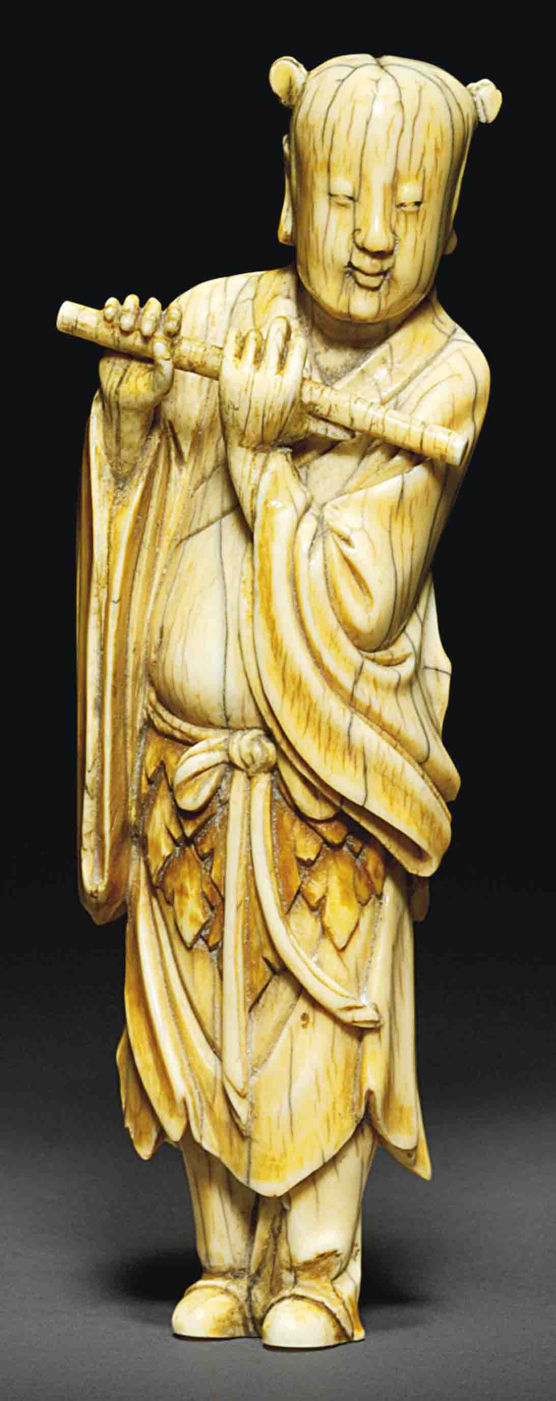 AN IVORY CARVING OF AN IMMORTAL , 17TH CENTURY Christie's