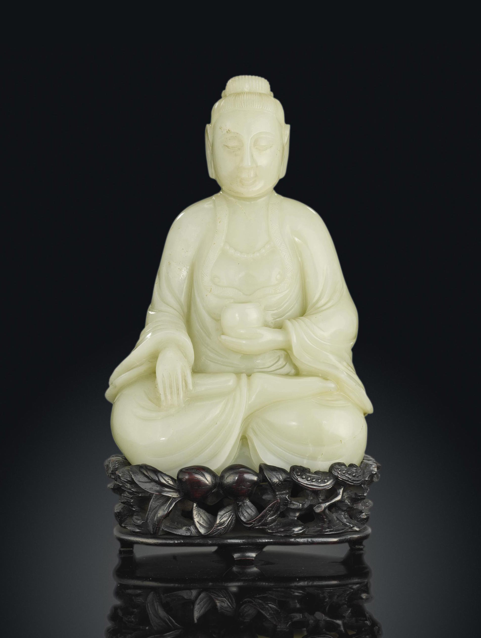A WHITE JADE FIGURE OF BUDDHA , 19TH CENTURY Christie's