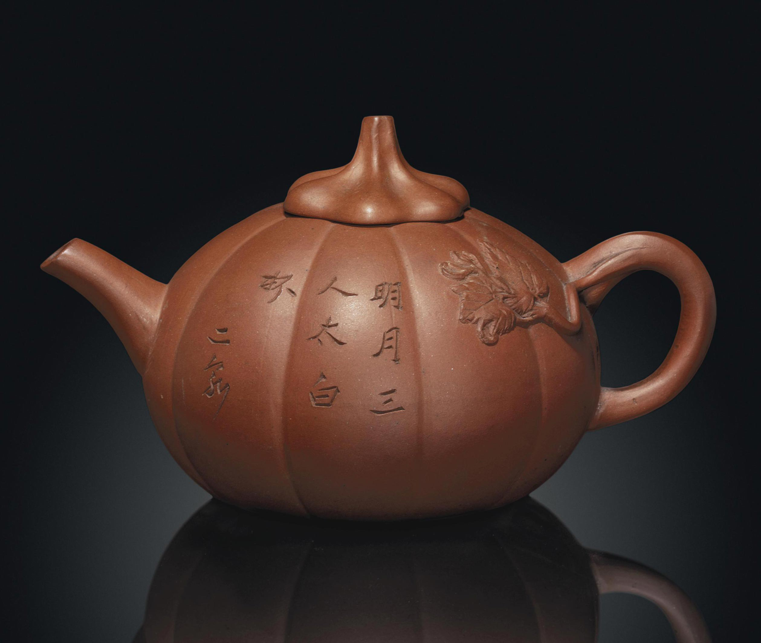 AN INSCRIBED YIXING 'PUMPKIN' POTTERY TEAPOT AND COVER , 19TH CENTURY