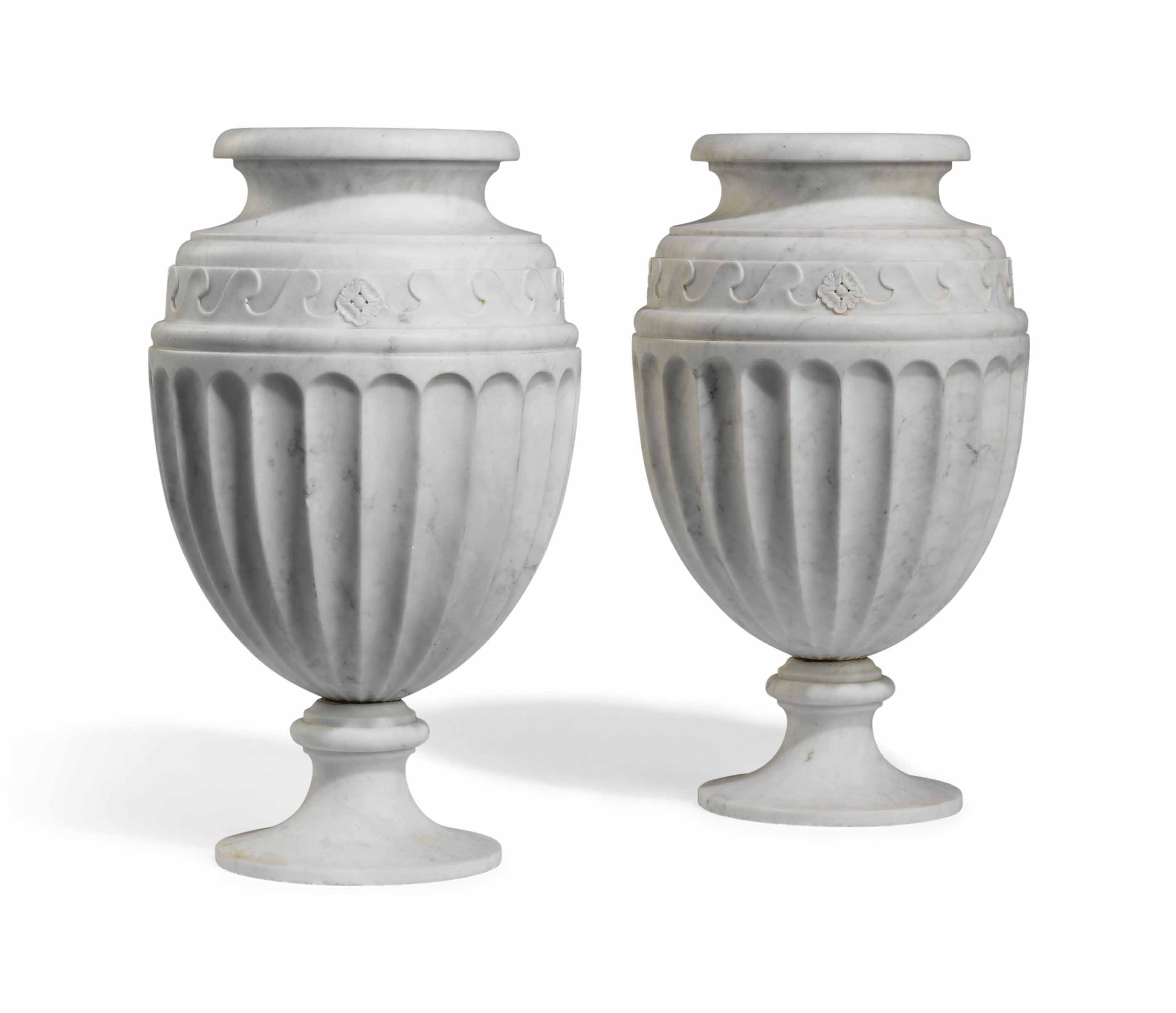 A PAIR OF WHITE MARBLE VASES , 20TH CENTURY Christie's