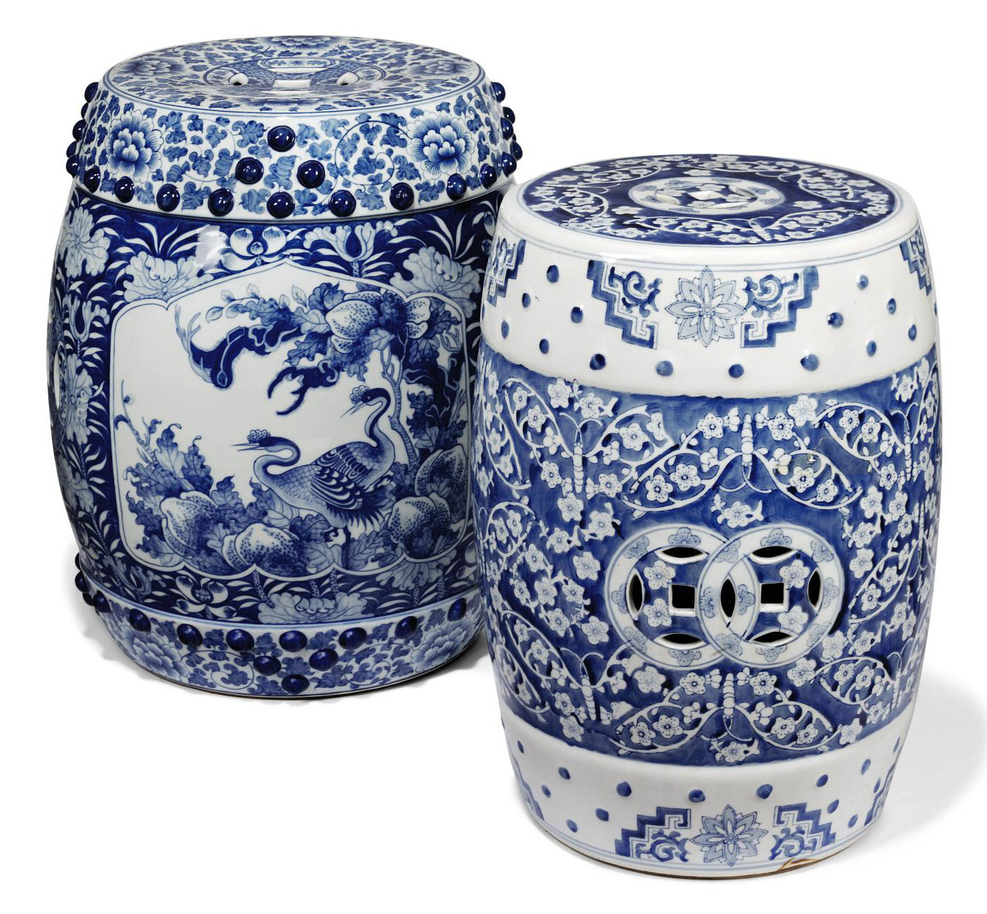 TWO CHINESE BLUE AND WHITE PORCELAIN PIERCED BARRELSHAPED GARDEN SEATS