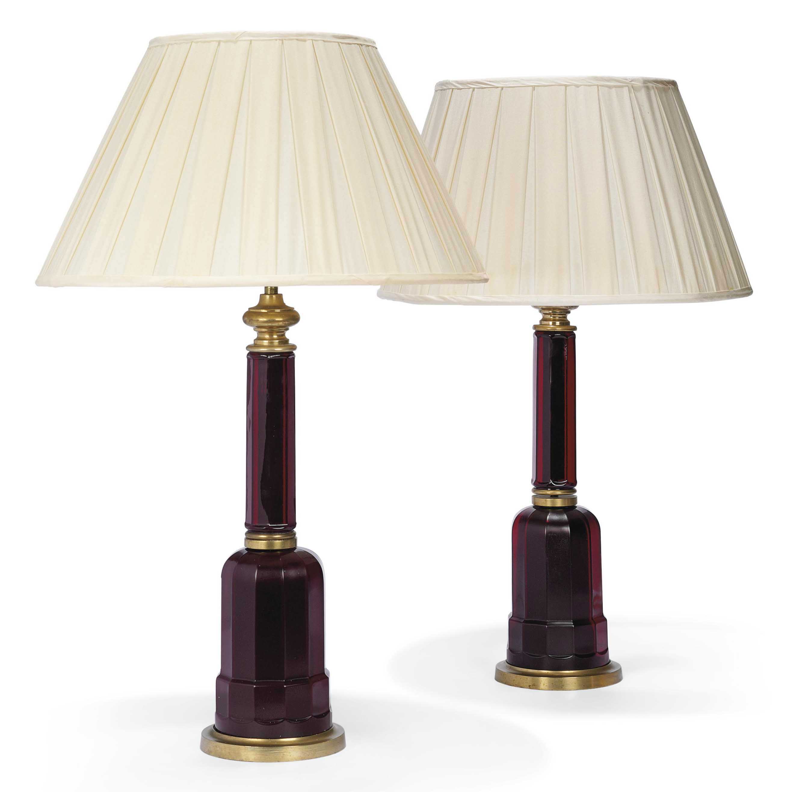 A PAIR FACETED CRANBERRY GLASS LAMPS , BY VAUGHAN, LONDON, LATE 20TH