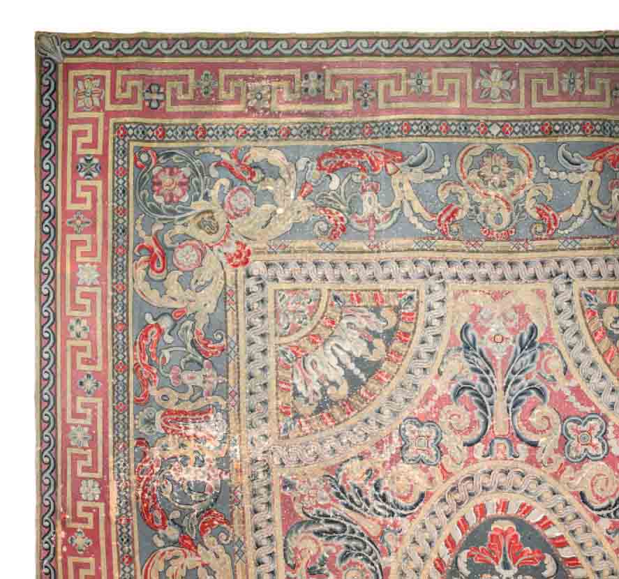 A LARGE NEEDLEPOINT CARPET