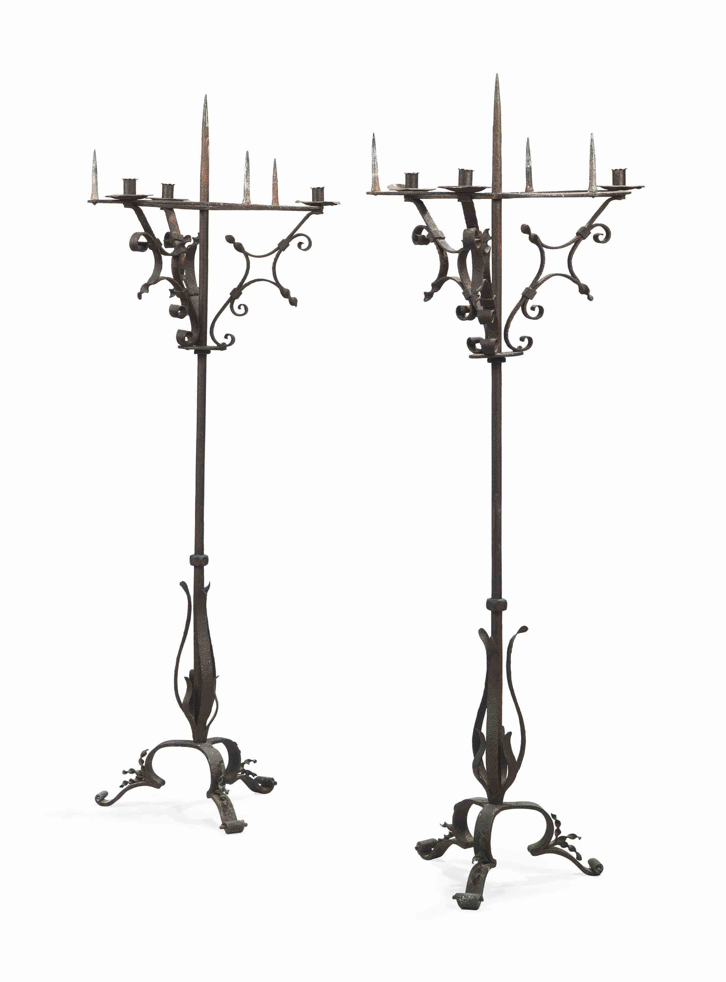 A Pair Of Wrought Iron Floor Standing Candelabra Early 20th