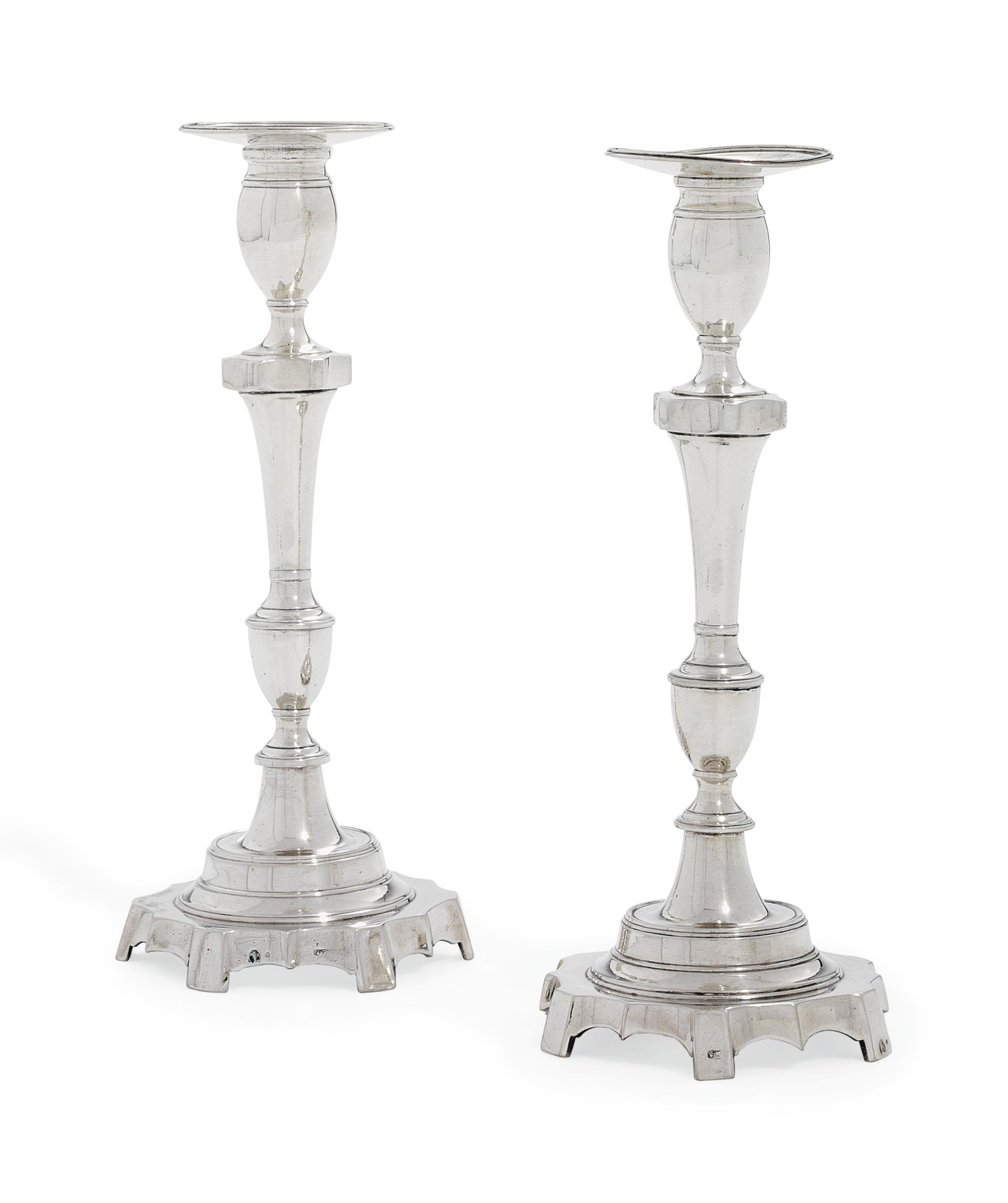 A PAIR OF PORTUGUESE SILVER CANDLESTICKS