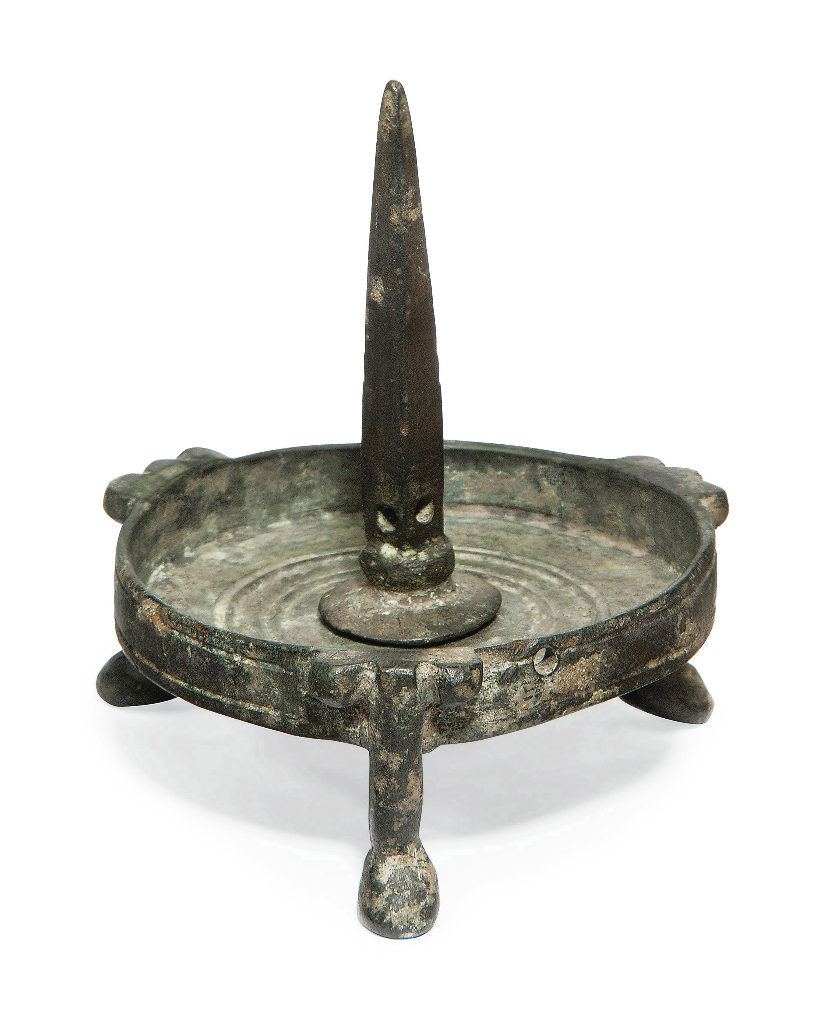 A BYZANTINE BRONZE CANDLESTICK STAND , 6TH 7TH CENTURY Christie's