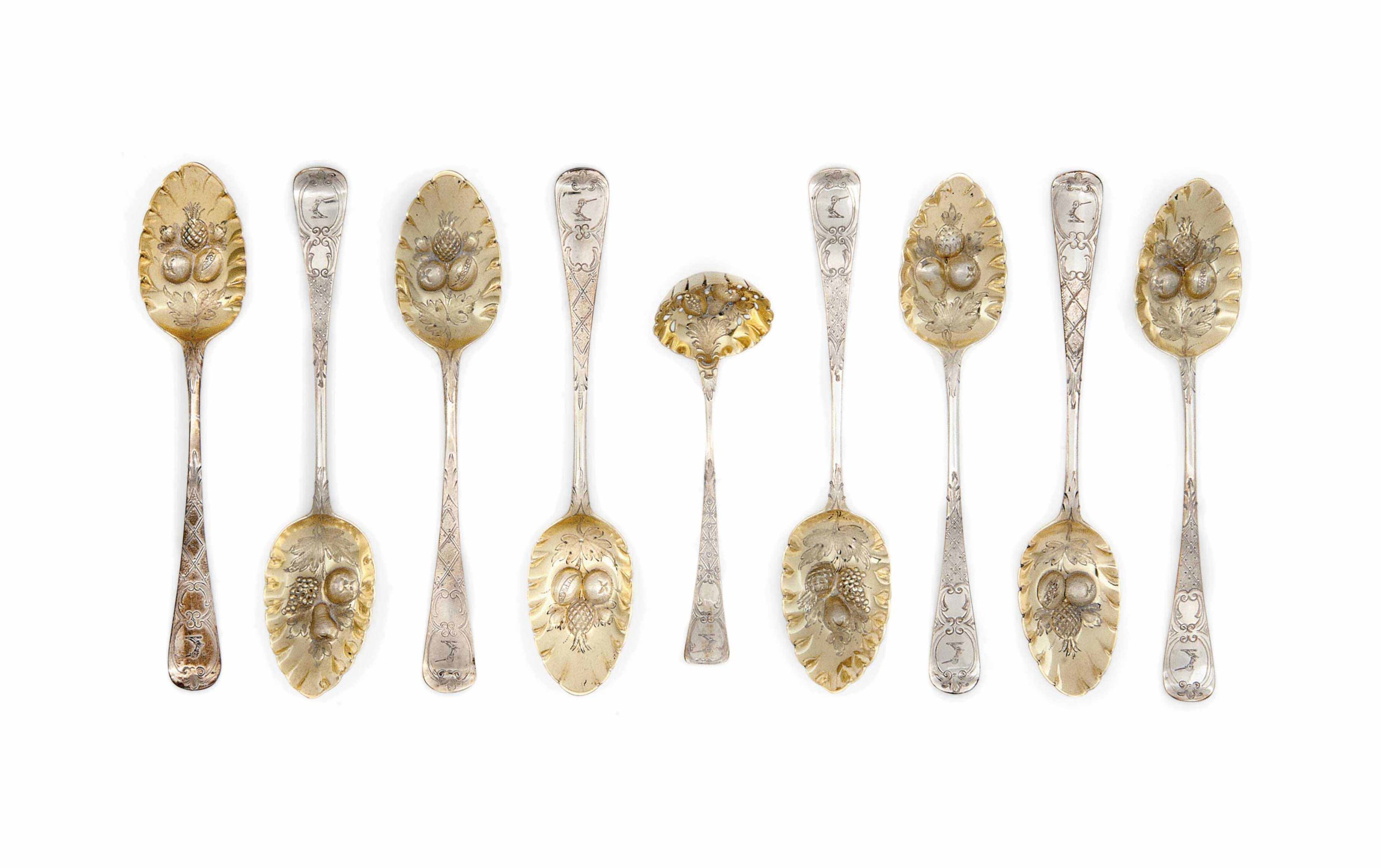 A CASED SET OF EIGHT III SILVER "BERRY" SPOONS AND ONE SIFTER