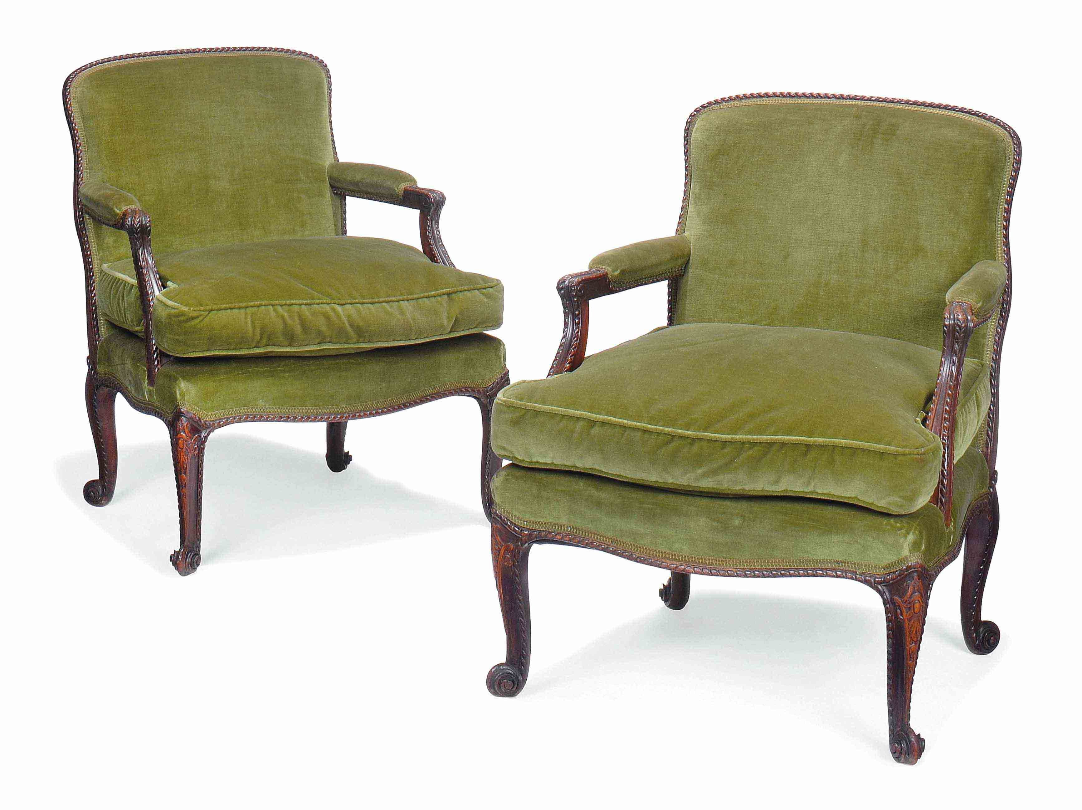 A PAIR OF CARVED MAHOGANY OPEN ARMCHAIRS A PAIR OF CARVED MAHOGANY OPEN ARMCHAIRS 