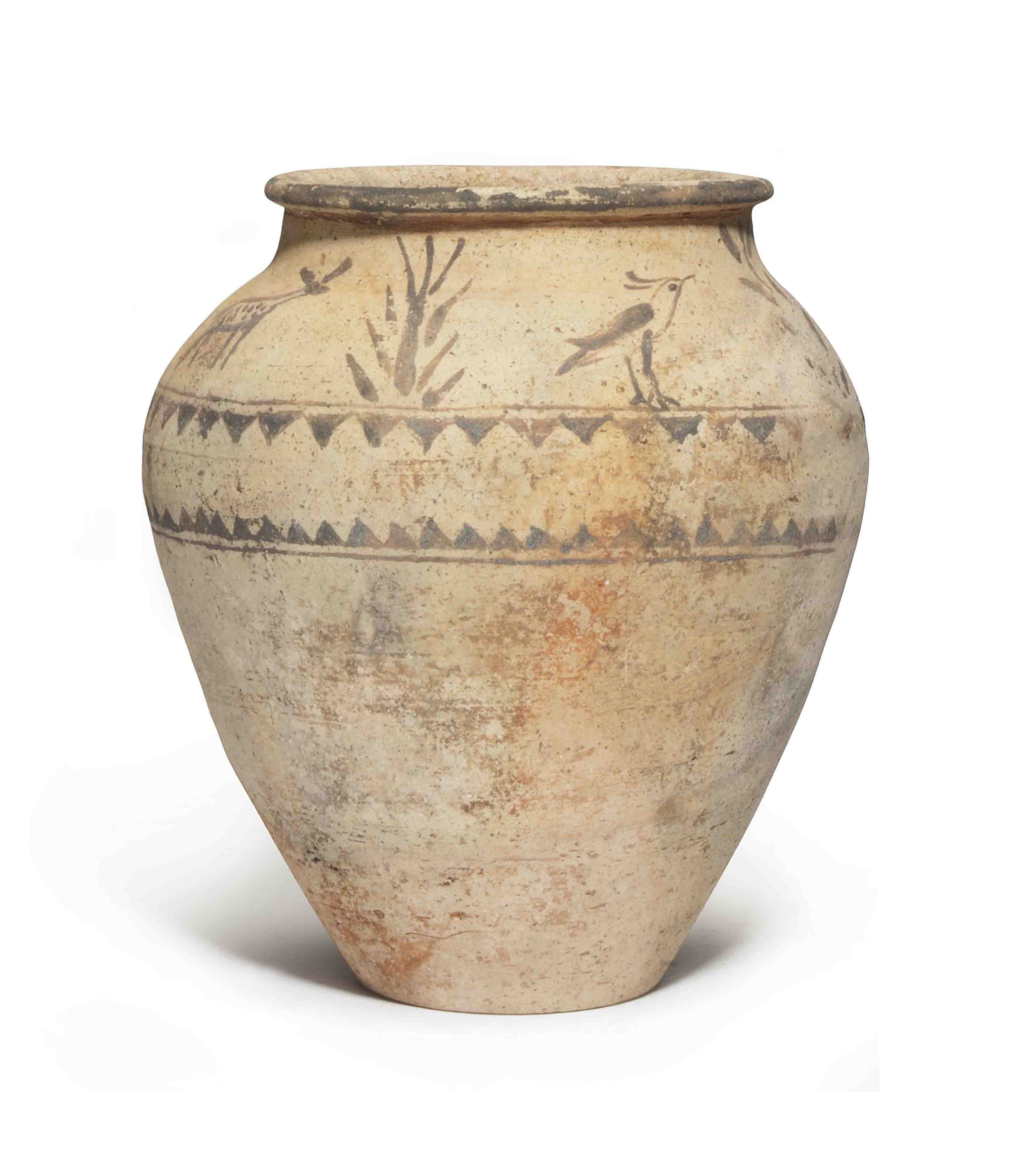 AN ANCIENT NEAR EASTERN POTTERY JAR , CIRCA 1ST MILLENNIUM B.C