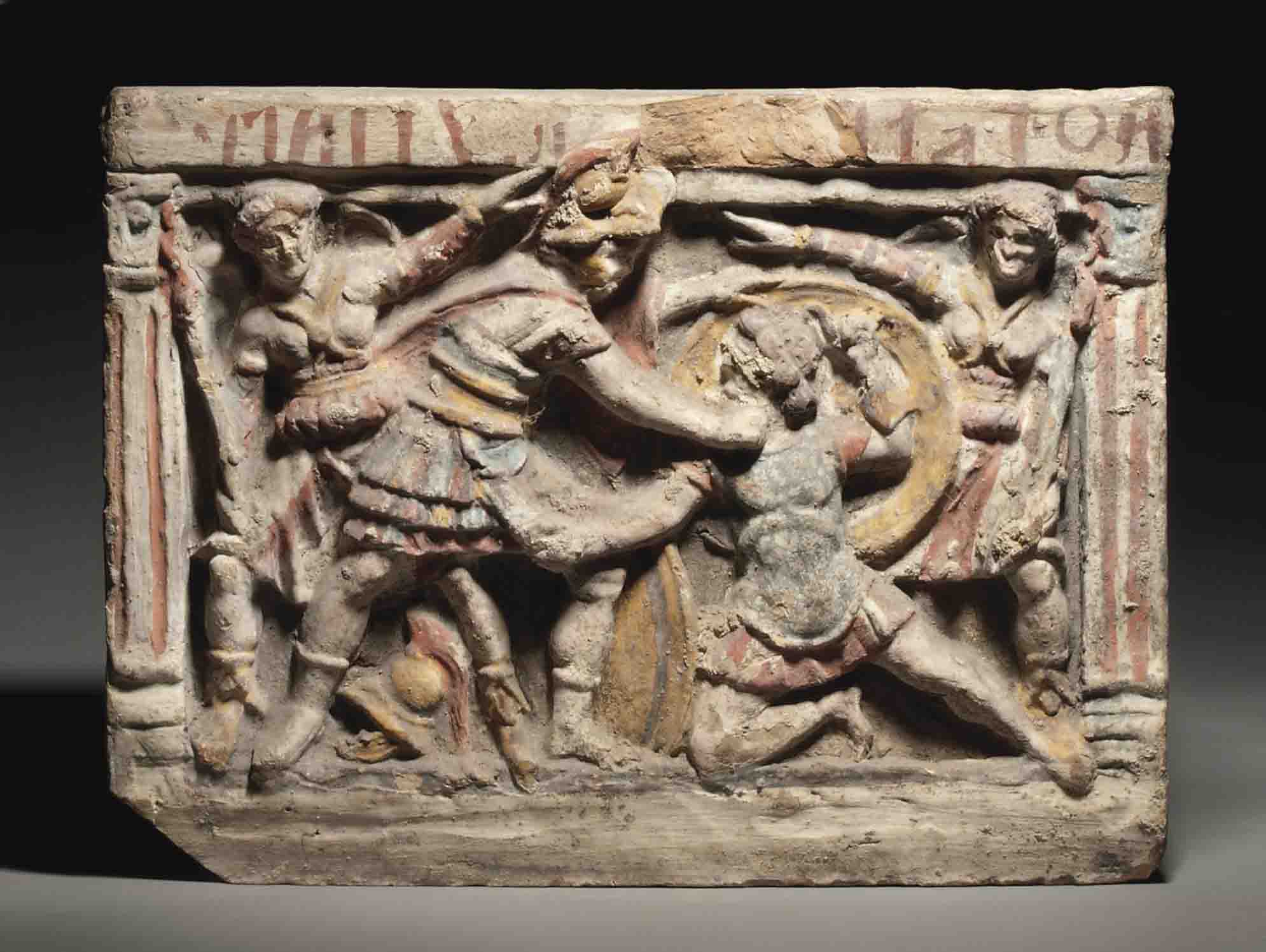 AN ETRUSCAN TERRACOTTA CINERARY URN , CIRCA 2ND CENTURY B.C. Christie's